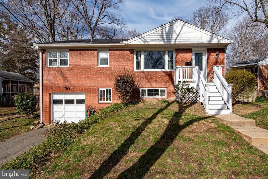 Don't blink because this won't last! Rarely available Hollin Hall Village rambler w/ basement in prime location.  This home sits on a friendly cul-de-sac across from a branch of Little Hunting Creek.  Walkable to shopping, local library and the Mt. Vernon trail.  Renovated kitchen with granite counters, pantry and breakfast bar.  Hardwood floors and wood burning fireplace on the main level.  Lower level is fully renovated with loads of recessed light, wood stove, full bath,  laundry and walks out to single car garage.  Beautiful hardscaping in fully fenced backyard with  shed and HUGE deck. Rainwater reservoir allows for an easy, green way to water your garden.  Great value in the Waynewood Elementary School District.  Hurry!All applications should be submitted online to Key Home Sales and Management at www.keyhm.com