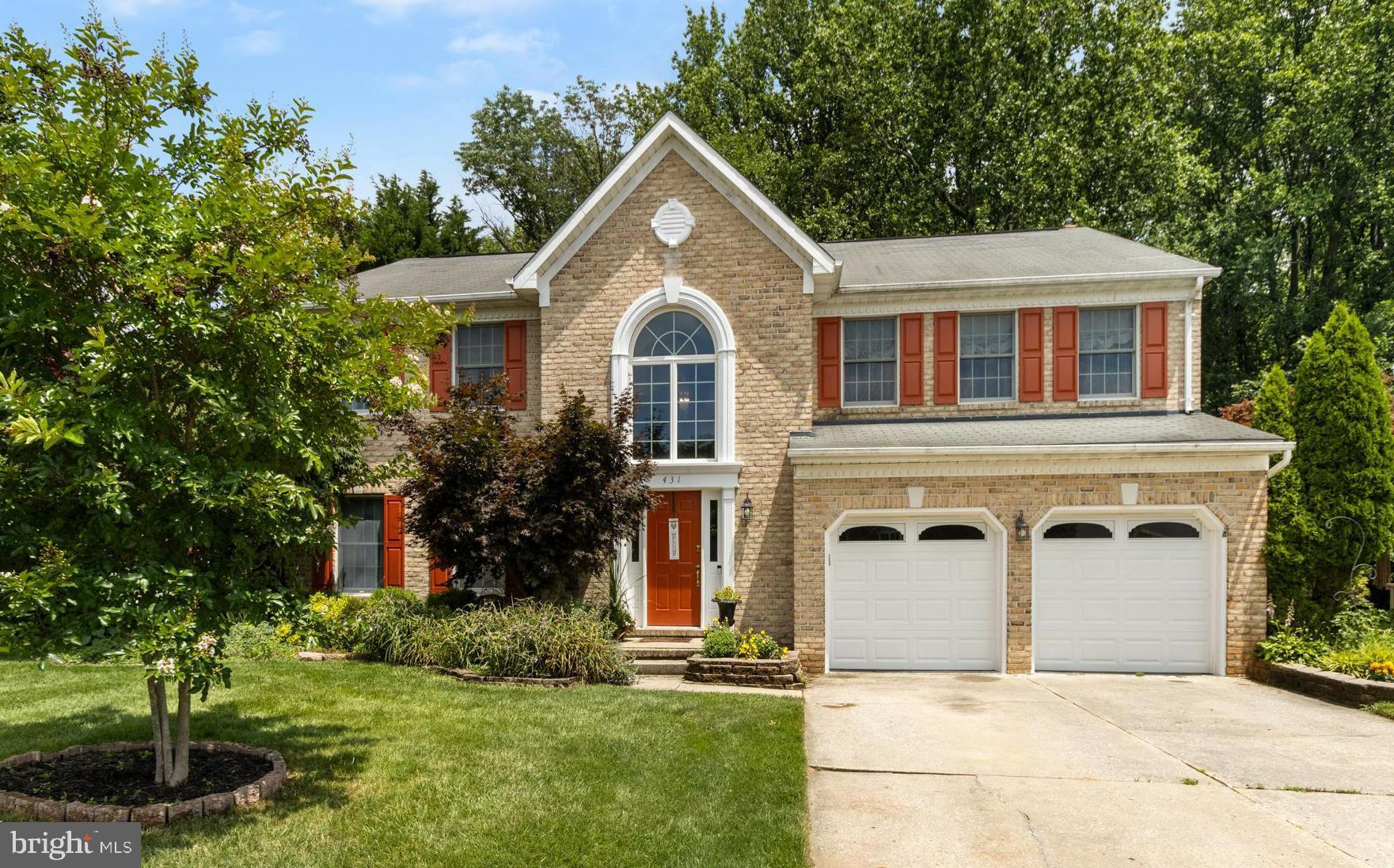 STUNNING 5 BEDROOM COLONIAL IN DESIRABLE PATTERSON MILL SCHOOL DISTRICT! Move right into this bright, spacious, and beautifully maintained home nestled on a premium, private landscaped lot that backs to mature trees. Impressive 2-Story Foyer with hardwood floors and dramatic atrium window. Formal living & dining rooms w/hardwood floors, crown moldings &chair rails. Gourmet kitchen w/center island, ceramic tile flooring/backsplash, recessed lighting, and breakfast area w/access to large deck. Sunken family room off kitchen w/gas fireplace. Upper level features new carpeting, a spacious landing, and convenient laundry area. Expansive primary bedroom w/cathedral ceiling, walk-in closet, and luxurious en-suite bath with garden tub and separate shower. Finished lower level features in-law quarters w/bedroom, full bath, service bar w/microwave, living area with fold-down counter &walk-out to rear patio. Huge storage room w/built-in shelving. Ample parking w/driveway and 2-car garage *** A GREAT FIND! DON'T MISS THIS BEAUTIFUL HOME! ***