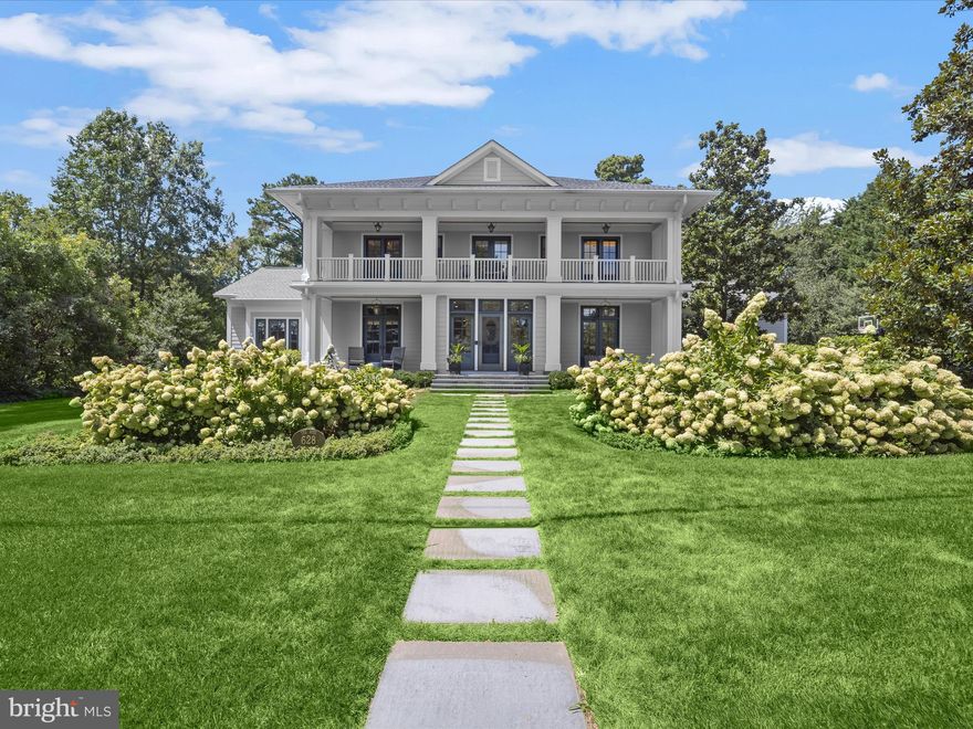 Welcome to 628 Ayrlie Water Road, an extraordinarily lovely 3,760 square foot turn-key house built in 2017. This beautifully built gem is located on a .84 level, gorgeously landscaped lot on a very pretty, quiet street across from the Chesapeake Bay, walking distance to both a private sandy beach on the Bay, and to the Gibson Island Club. From the first and second floors are Chesapeake Bay water views as well as spectacular sunrises every morning. The property is wooded in the back, and lined on both sides with plantings, creating extraordinary privacy in the back where there is an outdoor deck and outdoor fireplace and built-in grill. The backyard boasts a simply stunning, large lawn. From the property, one can take just a thirty second walk down the street to the private Gibson Island beach reserved for the use of homeowners. 
Designed by Vincent Greene Architects and built by Danny Plitt Construction, this special property provides an open-floor plan, boasts stunning interior design throughout, and has four en suite bedrooms.  The ceiling levels throughout are tall, and the ceiling designs are unique and attractive. Overlooking the private backyard is a large attractive glass porch with a stone paved floor, beadboard ceiling, propane fireplace and a stone paved exterior deck next to it, perfect for grilling and entertaining.  
With an outdoor porch on the front exterior of the house, one enters the front door to a nicely proportioned foyer with a den to the left and half bath to the right.  A simply delightful gourmet kitchen with plentiful cabinetry has an island with plentiful seating, top of the line appliances, and opens to a wonderful great room with an attractive wood burning fireplace. There is a large wine storage cabinet on the wall of the great room. Directly behind the kitchen is a butler pantry with a desk area, additional built-in cabinetry, a second sink and dishwasher and an extra refrigerator. Also located on the main level is a nicely sized en suite bedroom that could operate as a primary bedroom or guest suite. There is a mud/laundry room on the main level. 
Ascend to the second floor where barn doors at the top of the stairs slide open to a large entertainment room with an area for recreational activities and bunk beds. This room opens to a large Epay deck overlooking the beautiful backyard. An additional front deck spans the front of the house and can be accessed through two front bedrooms, one of which is the primary suite.  An additional bedroom tops off the second level.
Outside is a large oversized two car garage with dog shower (which could also be used to rinse pond and Bay floats) and an outside shower. With a charming front deck on either side of the front door, the house’s exterior is Hardie Plank or a similar material. This is a wonderful home with a great amount of curb appeal and high-end finishes. Move right on in without lifting a finger!  
Gibson Island is a private island within one hour of Washington, D.C. and Baltimore offering an absolutely extraordinary setting. Two thirds of the Island is undeveloped and is owned by the Gibson Island Corporation, the HOA.  There is no Bay Bridge crossing! On the Island is a 43-acre spring fed freshwater lake where one can enjoy non-motorized watercraft activities such as paddleboarding, canoeing, kayaking, fishing and swimming.  
The Island offers enormous privacy and security--there is an entry gatehouse staffed 24+Hours, and the Island is patrolled by the Gibson Island Police Force (GIPD).  The Corporation's Service Department offers yard maintenance and landscaping and other services for homeowners.  There is a full-service yacht yard.   The Island is a 20-minute drive to BWI Airport and the Amtrak Station.  There is a private country club (membership by invitation) offering yachting, fine dining year-round, an award-winning golf course, swimming, tennis, pickleball, croquet, skeet shooting, and more!  (c)