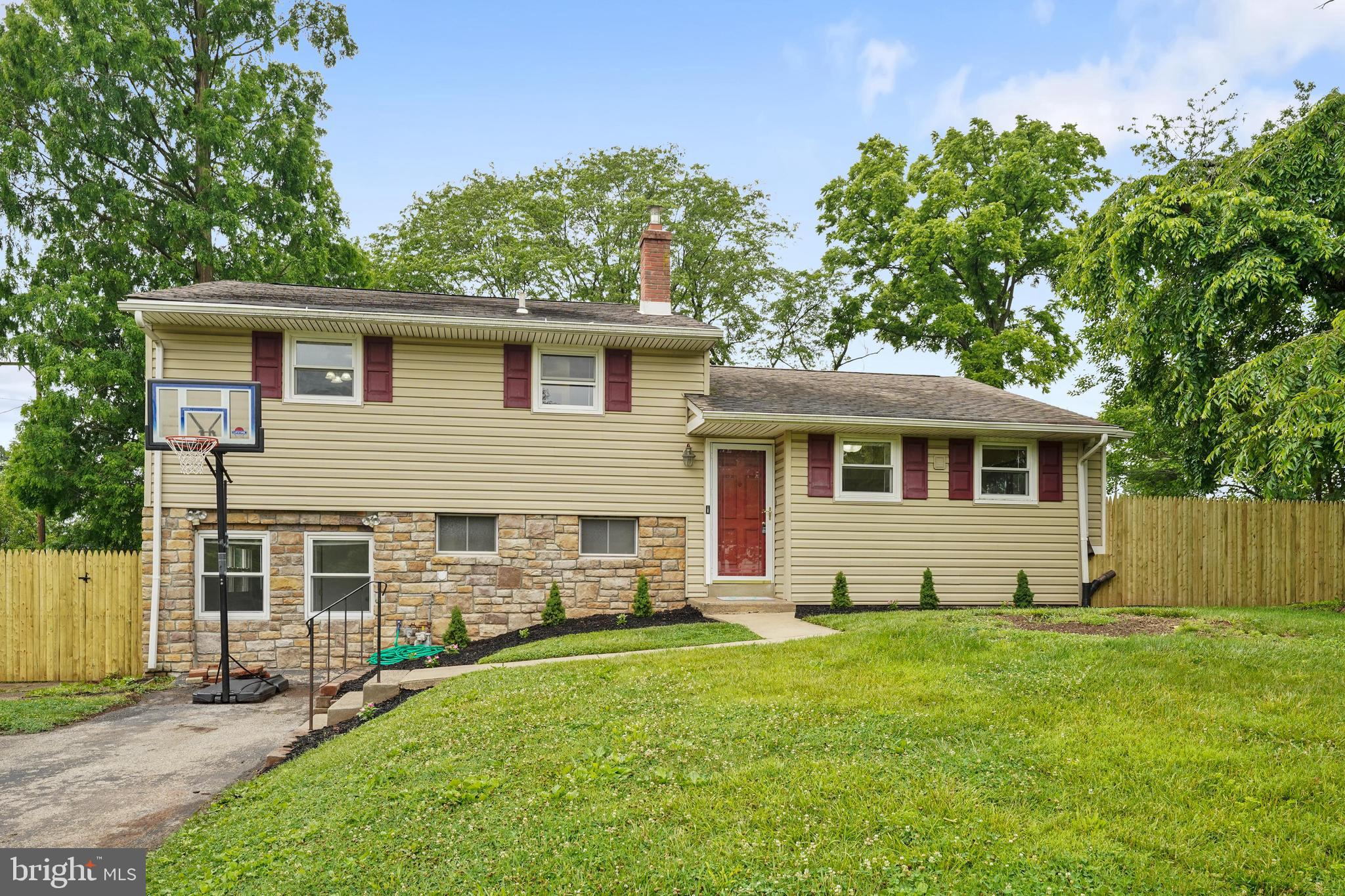 Beautiful split level home on a well maintained  lot offers many options for outdoor entertainment and summer fun. Lower level has ceramic tile in family room & 4th bedroom/ office/ workout area w/full bath.  Conveniently located off the family room is a screened-in porch perfect for summer living & entertaining. The main level boasts a ceramic tiled foyer and over-sized living room with hardwood floor & a large window overlooking the large, fenced backyard. Enjoy cooking in the sun-filled kitchen which has easy to clean ceramic tile flooring, butcher block counter tops & lots of cabinet space. Upstairs has three bedrooms and a full bathroom.  This home is conveniently located to shopping, restaurants, Route 422 & the King of Prussia Mall.