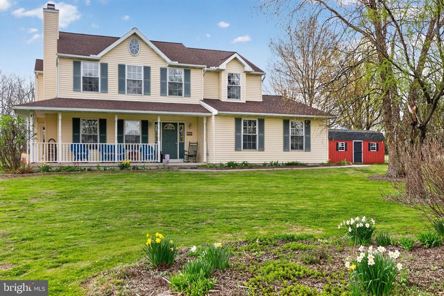 Set on a picturesque 2-acre lot in Quakertown, this well-maintained 4-bedroom, 2.5-bath home offers the perfect blend of comfort, space, and outdoor living. With 2,620 square feet of living space, the home features generously sized rooms and a layout designed for everyday living and entertaining.

A welcoming covered front porch sets the tone, while the rear deck overlooks an expansive backyard filled with thoughtful landscaping and open green space. The outdoor setting is truly special—complete with a fire pit area, small pond, chicken coop, red barn, and additional shed, offering both charm and versatility.

Inside, the home has been lovingly cared for and reflects pride of ownership throughout. Each room provides ample space and natural light, creating a warm and inviting atmosphere.

Whether you're enjoying quiet mornings on the porch, hosting gatherings around the fire pit, or taking in the peaceful surroundings, this property offers a unique opportunity to enjoy country-style living with room to breathe—just minutes from local conveniences.