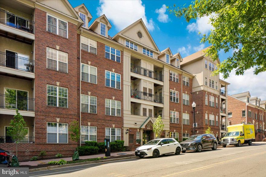 This isn't just a condo; it’s a lifestyle upgrade. Step inside and you’re greeted by an open, airy layout that feels much larger than the square footage suggests, thanks to high ceilings and a flow designed for hosting—or just spreading out after a long day. The kitchen is inviting with updated granite countertops and an open view of the rest of the home. 

The living room features a cozy gas fireplace, perfect for those nights when you want to unwind, and the oversized bedroom is a true sanctuary with enough space for a king-sized bed and a dedicated WFH setup. Best of all? You have your own private balcony, the perfect spot for a morning coffee or an evening drink while you take in the fresh air. 

The community features a clubhouse building with gym, package receiving, common room, and pool for those hot summer days. Underground assigned garage parking makes coming and going by car a breeze - and you’re two blocks from access to Rte 50, getting you anywhere you might need to go. Pet-friendly and investor friendly, there’s no catch. 

The current owner has meticulously maintained this home over many years to ensure it’s move-in ready. Updates include whole home paint (2026), dishwasher (2026), water heater (2025), Stove and microwave (2023), Bath surround (2021), Washer/dryer (2021), Refrigerator (2021), HVAC (2018).
Perhaps the best part of this home… isn’t the home. It’s the neighborhood. You are about two blocks from the Metro, and the walk there is a breeze through a dedicated pedestrian way rather than dodging traffic on the main drag. Within easy walking distance are world class coffee houses, Whole Foods, boutique fitness studios and restaurants. With a building that includes a clubhouse, gym, and pool, you’ve officially won the North Arlington real estate lottery.