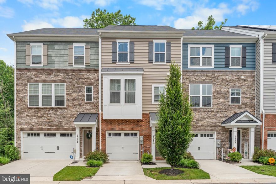 Stunning townhome in Crofton's Riverwalk Community!  No expense was spared designing this gorgeous home from top to bottom, with attention to detail around every corner, as  well as an EV Garage Charger Installed!  As you walk in, you will be greeted by a wide hallway taking you to your spacious rec room, as well as the lower deck backing onto a lush greenscape.  On this level you will also find a powder room, your utilities, as well as access to your garage.  Head on up the hardwood stairs to the open concept main level, complete with an expansive living room, dining area, and gourmet kitchen!  The kitchen offers plenty of cabinet space, elegant quartz countertops and backsplash, oversized undermount stainless steel sink, french door refrigerator with ice and water dispensers, gas stove with double ovens, garbage disposal, built-in microwave, dishwasher, pendant lighting, and the list goes on!  Off of the dining area, you will find your second level deck, perfect for grilling, or simply enjoying a cold glass of lemonade on a hot summer day.   You will also find another powder room on this floor (a bathroom on every level) as well as recessed lighting, and beautiful LVP floors throughout.  The bedroom level has 3 generously sized bedroom, a lovely hall bath, and bedroom level laundry!  Here you will also find a spacious ensuite bathroom in the primary bedroom, complete with double vanity, upgraded countertops, upgraded tile with accent finish, a frameless shower door, and a walk-in closet.  Bright and open, the home has plenty of storage, a fire suppression system, and low maintenance decks.  Conveniently located off of Route 3, you are just minutes to Waugh Chapel Shopping Center where you will find so many shopping, dining, and entertainment options!  Easy access to major commuter routes, about 20 minutes to Fort Meade and Arundel Mills, and centrally located between Annapolis, DC, and Baltimore.  Pets case-by-case.  Minimum credit score of 600 and minimum income requirement of 42x. Please contact listing agent for additional questions.