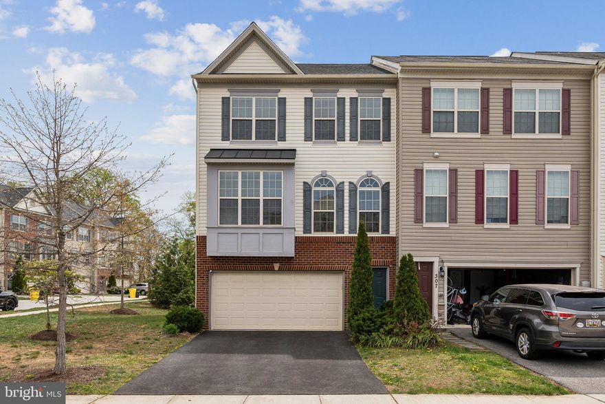 Live large in the heart of Arnold at 305 Hersdon Lane—just minutes from Annapolis and an easy commute to both Baltimore and D.C. Nestled in the sought-after Canterbury Village community and zoned for the Broadneck School District, this expansive 4-bedroom, 3.5-bath townhome delivers over 2,800 square feet of flexible living space across three finished levels.

Step inside to find sun-splashed interiors, hardwood floors, and an open-concept main level that flows seamlessly into the kitchen—perfect for entertaining or everyday life. The oversized owner’s suite is a true retreat, complete with vaulted ceilings, a spacious walk-in closet, and a private en suite bath. Downstairs, the fully finished lower level offers bonus space for guests, workouts, or a media room.

Outside, enjoy a private patio for relaxing evenings and summer BBQs, plus an EV charger already installed. Community amenities include playgrounds and green space—all with a low monthly HOA.

Whether you're commuting, downsizing, or right-sizing, this Arnold gem checks all the boxes for comfort, location, and lifestyle.