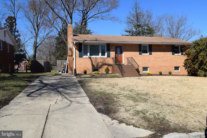 Welcome Home! This home is a beautiful well-maintained all brick rambler close to the Metro, Andrews Air Force Base, 495, and shopping. Situated on a large spacious lot, this home is sure to impress! Fresh Paint! Gorgeous hardwood floors in Living/Dining room and master.Fireplace In Living Room. Ceiling fans in all bedrooms.  Updated Kitchen has stainless steel appliances. Full Finished Walk Out Basement with Rec Room. There is a wet bar hookup in the basement.    In Quiet Community w/ Large Private fenced flat yard and patio.