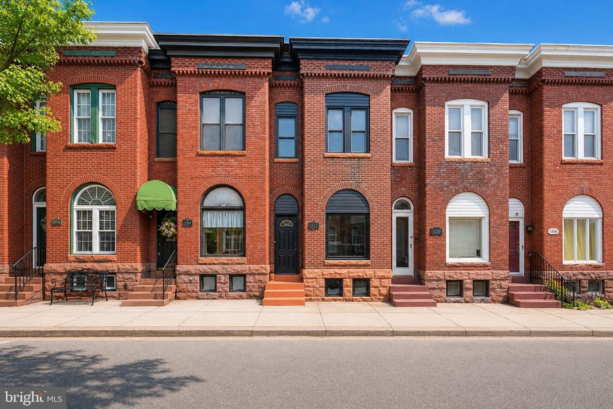 Well-maintained 3-bedroom, 2-bath interior rowhome in the Federal Hill Historic District offering approximately 1,796 total finished square feet across three levels. This traditional brick home features high ceilings, bright living spaces, and a functional layout.

The main level includes a spacious living area, separate dining space, full bath, and kitchen with wood cabinetry, stainless steel appliances, and ample counter space. Upstairs, you’ll find three bedrooms and a second full bath.

The partially finished lower level provides additional flexible space for storage, recreation, or utility use. Outdoor features include a rear patio area and covered rear porch. Additional highlights include central A/C, natural gas heat, public water and sewer, and on-street permit parking.