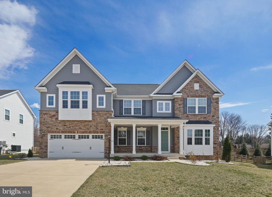 Stunning In-Law suite 6-Bedroom Home in Desirable Howard County, MD - Buy with instant equity! Welcome to this beautiful 3-year-old home with a first-floor in-law suite perfect for multi-generational living or flexible use.. With a total of 6 spacious bedrooms and 4 full bathrooms, this home is designed to meet the needs of every family member. The first-floor in-law suite is a standout feature, complete with its own full bathroom, offering privacy and comfort. Additionally, the finished basement includes a bedroom and a full bathroom, providing even more space for family or guests. Whether it’s a guest suite, a home office, or an entertainment area, the additional storage and functionality make it versatile for your home. No need to worry about additional new construction upgrade cost – the current owners have already taken care of it all! Enjoy front footage fee already paid in full, a finished basement, a fenced-in backyard with a charming stone patio, an inground swing, and beautiful river rock landscaping. A front covered porch adds outdoor comfort, while the added fireplace provides warmth and ambiance in the family room. Inside, you'll find luxury vinyl flooring throughout, ceiling fans in all bedrooms, and an added washer and dryer for convenience. The home has been recently appraised, providing instant equity for the new homeowner! Whether you're entertaining or relaxing, this home offers unparalleled convenience and versatility. The chef’s kitchen is a dream, featuring high-end appliances and plenty of counter space for meal prep. The eat-in kitchen flows seamlessly into the family room, offering the perfect setting for gathering and relaxing. Enjoy additional sitting space on the upper level, ideal for an office, play area, or cozy retreat. The primary bedroom has 2 walk-in closets, and a full bathroom with a double vanity. Additional upper-level spacious bedrooms also have walk-in closets. This home is situated on a peaceful cul-de-sac, with a 2-car garage, driveway, and off-street parking. Perfectly positioned in Howard County, MD, you'll have easy access to major routes like Route 100, 108, 175, and I-95, with quick commutes to Baltimore and Washington, D.C. The home is just minutes from BWI Airport, restaurants, shopping, pools, and medical centers. For everyday convenience, you can even walk to the nearby grocery store and local restaurants. Living in Howard County offers a lifestyle full of rich amenities, including local lakes, bike paths, sports, and recreation. Don't miss out on this opportunity to have an in-law suite on the first floor, along with multiple bedrooms offering versatile possibilities for your needs. Schedule a tour today and experience the perfect blend of comfort, convenience, and luxury living!