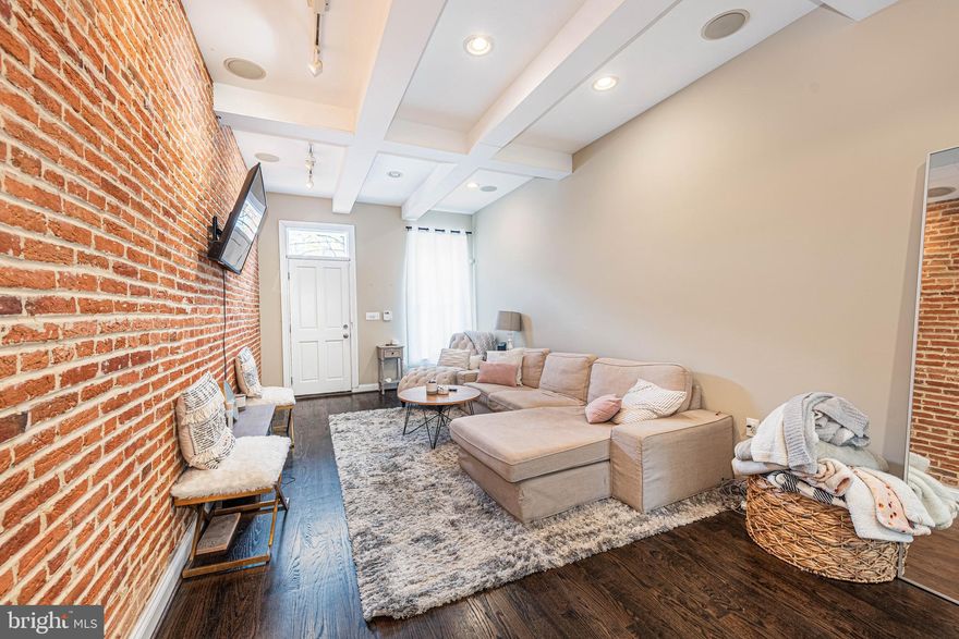 Welcome to 1521 Charles St !  Located in the heart of Federal Hill!  Over 1400 SF of living space featuring 9ft ceilings, exposed brick, a spacious living room with hardwood floors, a gourmet kitchen with granite counters & ss appliances, and a main level bedroom and full bath.  The upper level offers two bedroom suites with full baths and the finished basement has an additional bedroom & full bath! The rear deck and PARKING PAD make this a 10 out of 10! Convenient to stadiums, shopping and all city living has to offer!
  Pets are case by case    AVAILABLE JUNE 1