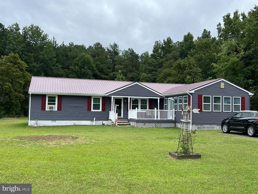 This well  maintained rancher sits on over half an acre with a large front yard and back yard with a wooded area behind it.  Stick built by E. S. Adkins in 1985.  It offers one floor living with 3 bedrooms, 2 full baths, living room, dining room, family room, kitchen, and office. Outside offers a screened in porch and deck where you can enjoy this quiet, peaceful setting. There is also a storage shed and 2 metal two-door garages.   Addition and new roof in 2017.  New windows in 2018.   Septic pumped, distribution box replaced, and passed inspection in Sept. 2023. This is an ideal location only 5 miles from Salisbury and 20 miles from Ocean City where opportunities for shopping, dining, entertainment and recreation are numerous and varied. Don't miss this opportunity.  This home is being sold as is.