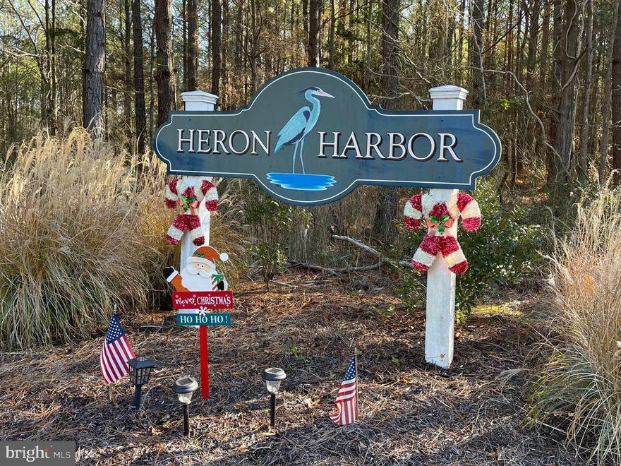 Nice buildable lot in the water privileged Heron Harbor.  This private lot is the perfect place to build your new home. Within walking distance to the community dock and natural beauty of Fishing Creek. This one will not last long!!