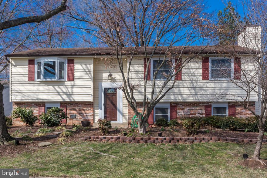 A charming and light filled split foyer home situated on a cul de sac. Wonderful floor plan on the upper level with a gourmet kitchen and acacia hardwood floors.  The lower level rec room welcomes you to a wood burning fireplace and a bonus space for home office set up or a guest suite.  Large back yard.