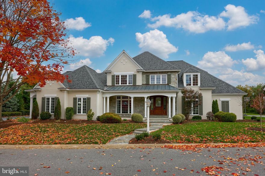 Elegant 6,796 finished square foot home located on a picturesque lot within the highly desirable gated community of Bent Creek. Backing to green #2 and fairway #8 with pond, this 5-bedroom, 4.5-bathroom, 3-car garage home is filled with stunning features. Upon entering, you are greeted by the majestic 2-story foyer with beautiful hardwood flooring that runs throughout the first floor. The luxurious, entry level primary suite features a tray ceiling, large walk-in closet, whirlpool tub, tile walk-in shower, two vanities, and laundry closet with washer & dryer hook ups.  Stately 2-story family room with vaulted ceiling offers a perfect space for relaxing while you bask in the glow of the natural sunlight that fills the home from the many windows and skylights, or cozy up by the gas fireplace which has a hydraulic television mount above the mantle. Sizable kitchen with breakfast nook and gas fireplace creates a wonderful space for cooking and entertaining, and includes built-in wine rack, large island with granite countertop, subzero paneled refrigerator, double wall oven, custom tile backsplash, walk-in pantry, and built-in desk. The main floor also includes formal dining room with tray ceiling, crown molding, and French doors, office/den, and half bath. Ascend the staircase to the vast second floor which is comprised of 3 spacious bedrooms each with a walk-in closet, 2 full bathrooms, bonus room, and laundry room with cabinets, countertop, and utility sink.  Make your way down to the impressive finished lower level which provides 2,615 square feet of living space — perfect for hosting guests and is comprised of an oversized bedroom, full bathroom, kitchen, and multiple rooms for recreation. Additionally, home also offers Smart House System which controls all lighting from phone app, home security system, radiant floor heating on first and second levels, and newer flooring throughout. Screened-in rear porch overlooks the professionally landscaped mature lawn as well as the golf course, and leads to the patio with fountain where you can relax in the evenings and enjoy the warmth of the firepit.  Owner would consider owner financing.