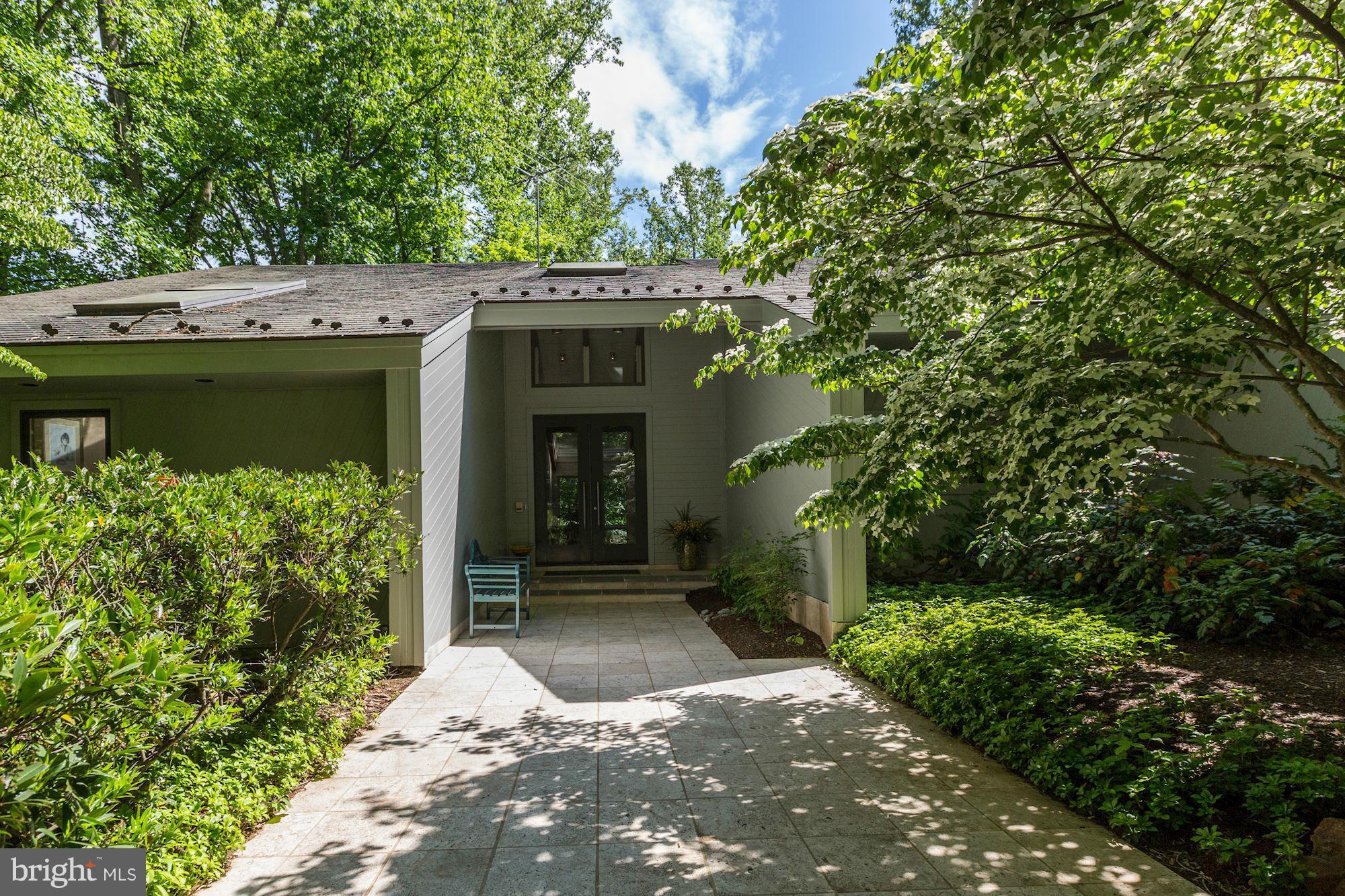 NEW LISTING An architects dream home! Welcome to this serene contemporary designed with walls of windows and views from every room. Elegant finishes abound from the front entry door, to the beautiful wood and stone floors, combined with an exciting floor plan! Entertain your family and guests in this inviting and serene residence. Master suite includes a library loft along with a fireplace. Hurry!