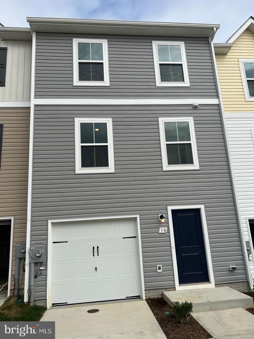 For Berkley County Rental at Hedgesville !!! This rental is located at Dillon Farm in Hedgesville, WV. The home is Newly built and you are the first person to move in!!! This 3-level Townhome has 3 Bedrooms, 2.5 baths, Granite Countertops, and fully upgraded appliances with Farmhouse package upgrades. This home has easy access to many nearby stores, Burger King, Martins, and other stores. Also easily accessible to Pharmacy/Medical centers / Route 9 and I-81. Perfect location for those who work in Virginia, WV, PA, and Maryland. It’s the center point of all 4 states for easy commute. This Home has Front Entrance Attached Garage with Inside Access. In the Entry level, Finished Recroom / Office Room/Bedroom(you use it as the 4th Bedroom)... The main level comes with an open-concept floor plan which has a Living room / Kitchen and Dining. The kitchen has fully upgraded appliances (Double door steel Refrigerator, Dishwasher, and Microwave) with Granite countertops. The 3rd level has a Master Bedroom with a Master Bath, and 2 Children's Bedrooms (A total of 3 Bed Rooms and 2 Full baths). Laundry Washer /Dryer is in Unit, Energy efficient windows, Gas for Water heating/ Room Heating. Pets are allowed. The security deposit and first month are due when you sign the lease. May not last long at this Home for Rental in the Market, Call or schedule the tour !!!