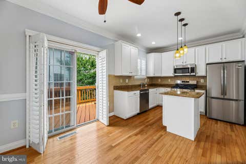 Photo of 113 Meadows Lane, ALEXANDRIA, VA 22304 (MLS # VAAX2063524)