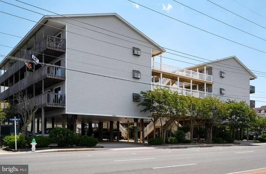 **Location, Location, Location!  Come see this adorable and affordable North OC, ocean block condo!  Condo comes mostly furnished with 2 bedrooms and 2 baths.  Condo features laminate flooring in the kitchen, dining and living area.  Wainscoting in the entry way and replacement windows.  Kitchen features newer Bosch dishwasher, washer/dryer combo and microwave.   Extensive work to replace the inner decking and railings of the building has just finished.  One assigned parking spot and also overflow for 2nd car.  Two parking passes issued.  Large south facing deck with storage box for all of your beach gear.  Walk to Northside Park and many amazing restaurants and shopping spots.  Just steps to the beach!  Seller is offering a one year home warranty.