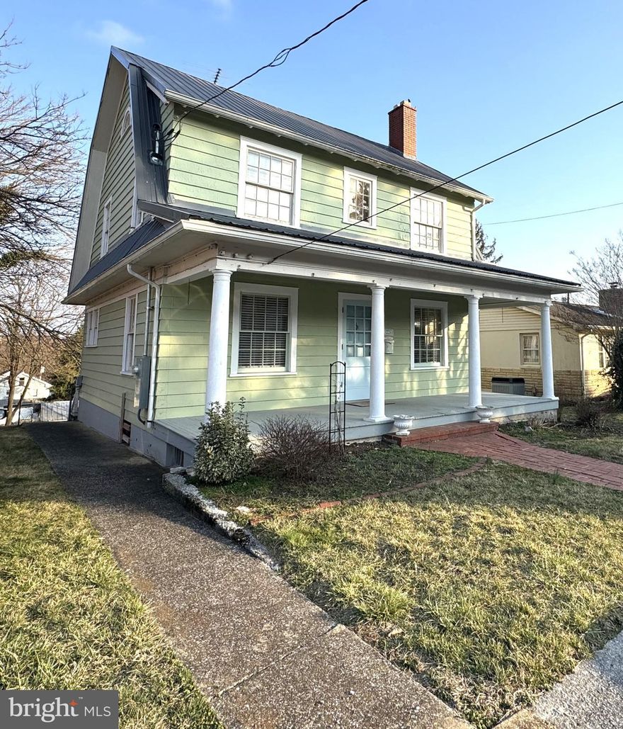 Multiple offers received.  Seller requests highest and best offers by 12:00 noon, Friday, May 9, 2026. Welcome to 226 S Rosemont Avenue, a charming Dutch Colonial-style home nestled on the west end of Martinsburg. This delightful property blends modern comforts with timeless vintage character. Original hardwood floors flow throughout, enhancing the home's classic appeal. The inviting living room features a beautiful fireplace and built-in display cabinets, while the formal dining room showcases a built-in corner hutch and French doors leading to a covered back porch—perfect for relaxing and enjoying the scenic rear yard. The updated kitchen comes complete with stainless steel appliances and gas cooking, ensuring convenience for any home chef. The upper level boasts 3 spacious bedrooms and a full bathroom.  Additional highlights include CAC, natural gas heat, a metal roof,  a walk-out basement with laundry area and workshop space, and a detached 1-car garage accessed via the alley. Vintage touches like crown molding, wide baseboards, a vintage dining room chandelier, and glass door knobs bring a sense of history to every corner. With its blend of old-world charm and modern amenities, this home offers the perfect place to create lasting memories. Conveniently located, this home offers easy access to I-81, making commuting a breeze. You'll also be just minutes away from local schools, the hospital, and the train station. With shopping and dining options nearby, everything you need is within reach, providing both comfort and convenience in this charming Martinsburg home!  Home is being sold "as is".