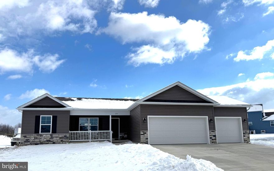 To Be Built 1342 sqft Rancher with open floor plan, vaulted ceilings and LVP Flooring in main living areas.  The kitchen has granite countertops, island, gas cooking and stainless steel appliances.  The primary bedroom has full bath with tile shower w/ grab bars and large walk-in closet.  The exterior features brick accents on front, an oversized/ extended 3 car garage with auto openers, rear 10x12 deck, and concrete driveway included.  Natural gas HVAC, hot water heater, and stove.  *Photos are Similar Construction**