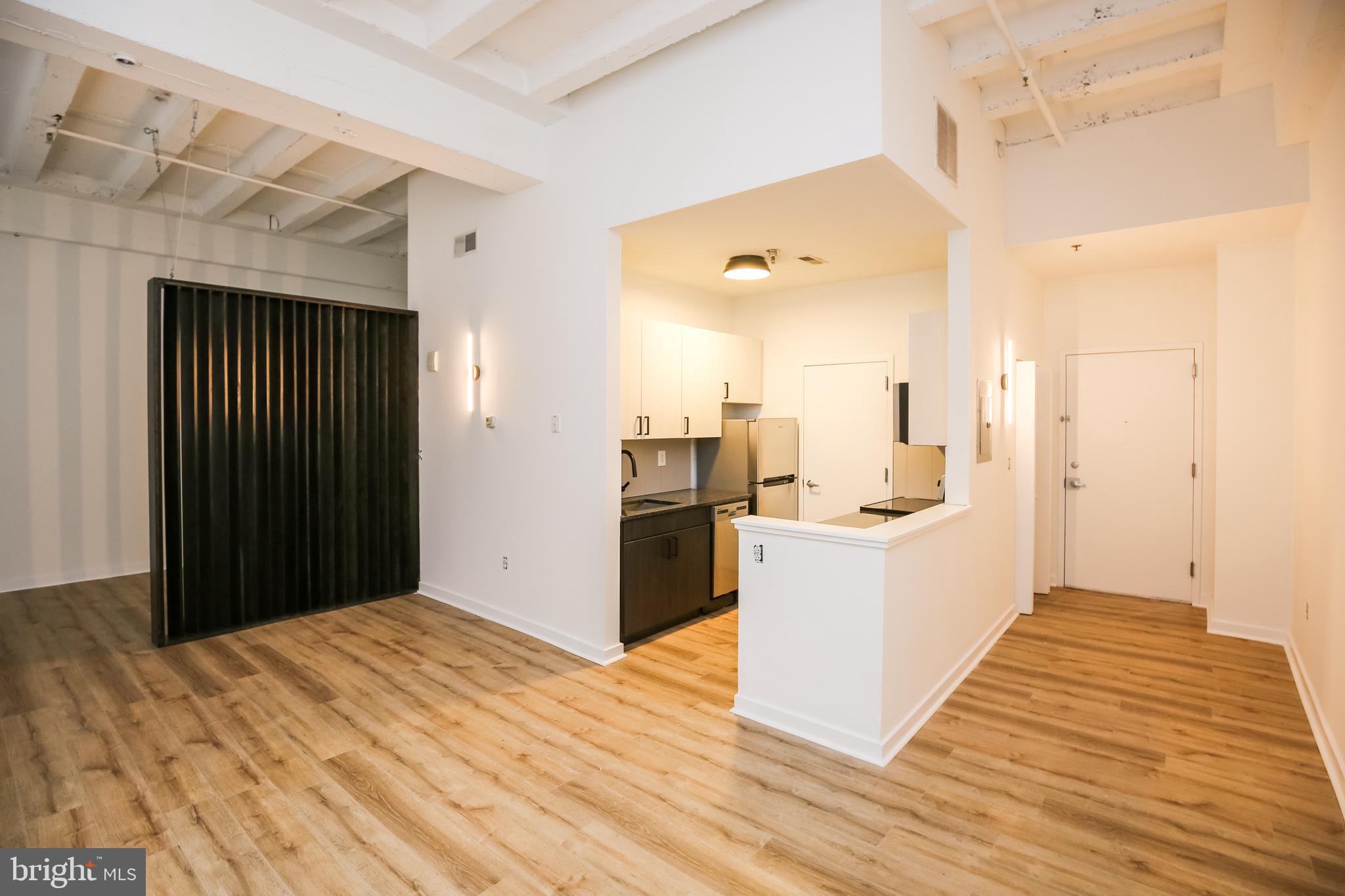 Due to the Coronavirus pandemic, all in-person showings for occupied properties are currently on hold. We will be doing our best to provide video tours of these units when available and are still accepting applications sight unseen. Please contact us for more information on this listing. Available NOW: The Schoolhouse Lofts are a community of modern-industrial artist lofts inside the historic Daniel Boone School located at the cross-section of Fishtown and Northern Liberties area of Philadelphia. This beautiful, late gothic revival building was classically known as the Philadelphia school for the rebellious. This building brings a unique mix of old and new with trendy design elements like minimalistic lighting fixtures, exposed beams, original brick work, and fantastically intricate original details. This leading boutique building offers modern conveniences for modern living. The public spaces such as the bike room, mailroom, and multiple laundry rooms are custom engineered to minimize stress and maximize well-being. This renovated unit is a one bedroom with a divider/one-bathroom space, offering high ceilings, huge windows, good storage space, and a bright and airy atmosphere. All units have central AC! FREE laundry in laundry rooms located on the 1st and 2nd floors of the building. Note: Elevator will soon be available in the building Garage parking may be available by a 3rd party company at an additional monthly cost, please ask your agent for more details! About the Neighborhood: Located at the cross-section of Fishtown and Northern Liberties, among some of the city?s best dining, shopping, and entertainment options. You?ll be walking distance to The Piazza at Schmidts, Acme, Love & Honey Fried Chicken, Jerry?s Bar, Heritage, Paesano?s, Vesper Dayclub, and One Shot Cafe, to name a few. Easy access to highways 95 and 676, as well as public transportation with the Girard station for the Market-Frankford line just a block away. Lease Terms: Generally, first month, last month, and one month security deposit due at, or prior to, lease signing. Other terms may be required by Landlord. $55 application fee per applicant. Pets are conditional on owner?s approval and may require an additional fee, if accepted. ($50/dog, and $25/cat monthly pet rent). Tenants responsible for all utilities: water and gas billed by a 3rd party company, electricity, cable/internet.