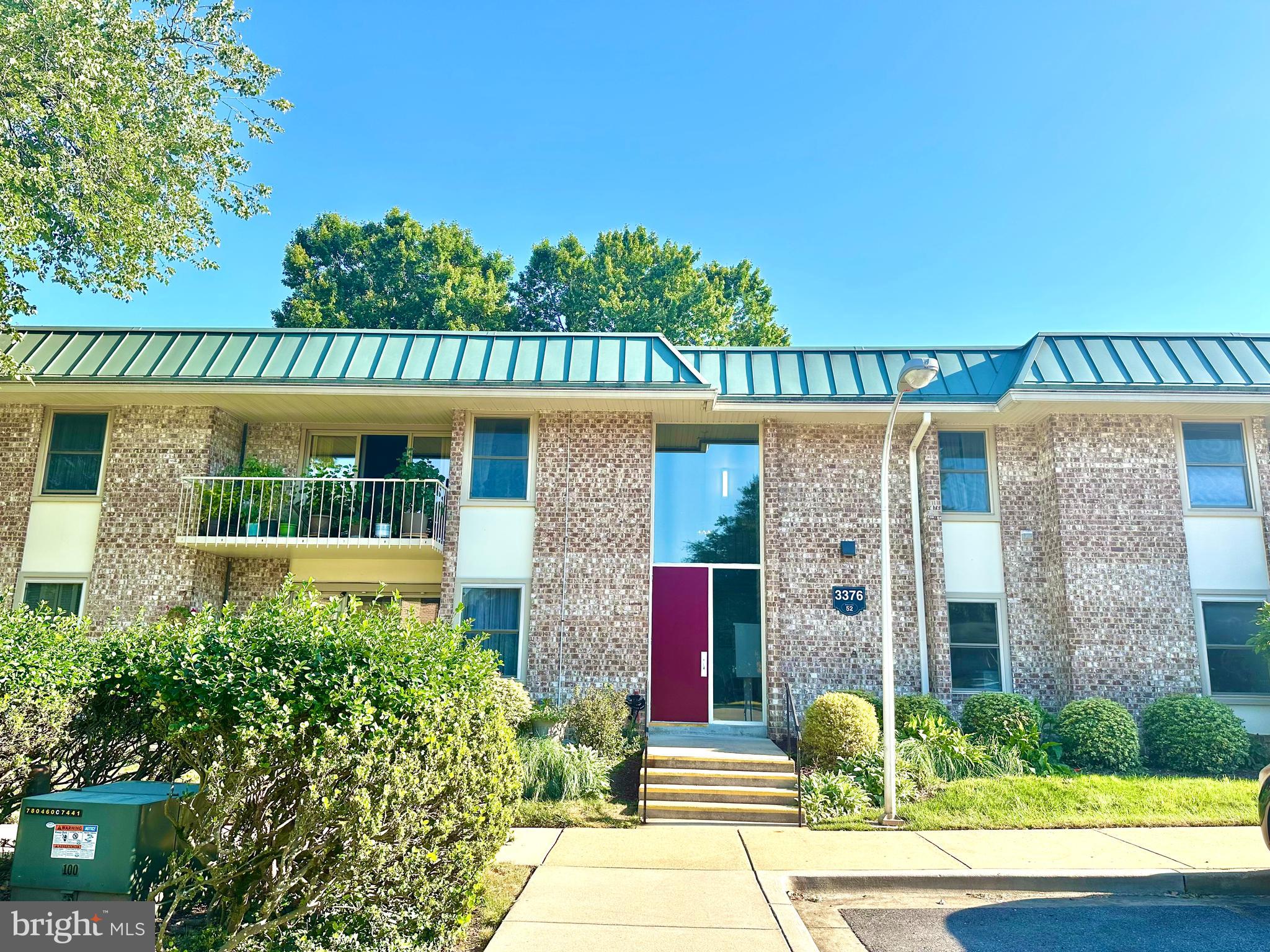 55+ Premier retirement community, Carlyle Model, Two bedrooms, one full bath COOP. Full of natural light, Entire unit FRESHLY PAINTED, NEW CARPET, NEW LVP FLOORING in Kitchen and bathroom. Enjoy the SCREENED IN BALCONY with BEAUTIFUL treed views. CENTRAL AIR CONDITIONING AND HEAT PUMP . Storage cage and assigned parking space too. Move in ready. COOP fee includes basic cable TV and high speed internet, all utilities, general unit maintenance and property taxes. Enjoy all the amenities this community has to offer, golf, tennis, pickleball, swimming, and fitness center. Multitude of clubs and activities. Close to shopping and restaurants.