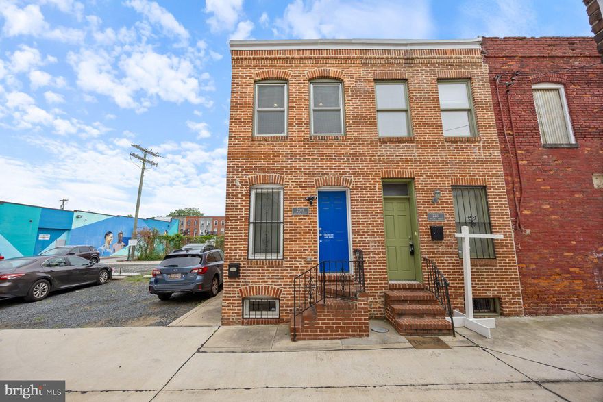 Adorable, move-in ready 3BR/2.5BA end of row brick Townhome located in the heart of Patterson Place.  Open the door into your forever home to find an open concept main floor, tons of natural light, recessed lighting, a freshly painted interior, and original hardwood floors throughout.  The main living area consists of an open living room, dining room, half bath, and step down kitchen.  The kitchen offers plenty of cabinets and counter space, stainless steel appliances, and a side door which leads to parking.  On the second floor is a sizable secondary bedroom, a large primary bedroom, and a full bath with a deep jetted soaking tub.  From the second floor landing, take the staircase leading up to a large wood rooftop deck with views of your new neighborhood.  The lower level offers the third bedroom, a full bath with a walk-in shower, and laundry.  This home is ideal for any new homeowner and is located in close proximity or walking distance to shopping, restaurants, and commuter routes.