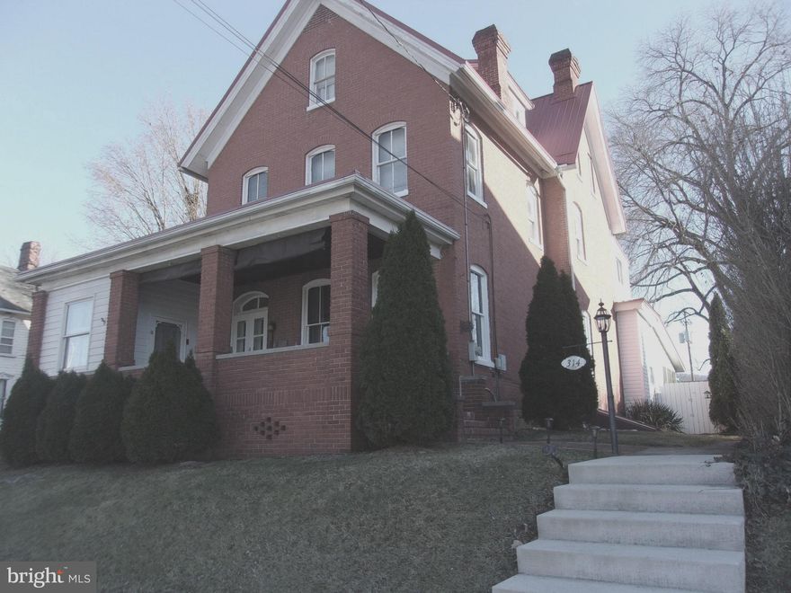 Charming 1873 Brick Home in the Historic District on a Half-Acre Lot. Nestled in the heart of picturesque Bedford Borough, this stunning home offers a rare opportunity to own a piece of history while enjoying modern comforts. The property exudes character with its original architectural details, including a classic facade that harks back to a bygone era. Rich in historic charm, the home showcases all original oak hardwood floors, beautifully preserved woodwork, and an elegant staircase in superb condition. Three ornate soapstone fireplaces add warmth and character throughout the home. Spacious and inviting, the home features multiple bedrooms, 3.5 baths, and a generous living area that offers exceptional flexibility for large families, guests, or creative living arrangements. The bathrooms have been thoughtfully updated, blending modern convenience with timeless architectural details. The kitchen is wonderfully modern, featuring stainless steel appliances and an island with a custom made wooden countertop. The home boasts high ceilings, thick brick walls that help retain heat, and generously sized rooms that reflex the craftmanship of the era. Every corner highlights the beauty of its historic construction. Situated on a half acre lot, the property provides abundant outdoor space with endless possibilities - gardens, entertaining areas, maybe a pool. With its size and layout, the home is well suited for multi-generational living or a variety of residential uses. Located within walking distance to local shops, dining, and cultural attractions, this home not only offers a unique living experience but also places you at the center of a vibrant community, rich in history and charm. Don't miss the chance to own a piece of Bedford Borough's legacy.