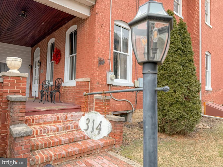 Charming 1873 Brick Home in the Historic District on a Half-Acre Lot. Nestled in the heart of picturesque Bedford Borough, this stunning home offers a rare opportunity to own a piece of history while enjoying modern comforts. The property exudes character with its original architectural details, including a classic facade that harks back to a bygone era. Rich in historic charm, the home showcases all original oak hardwood floors, beautifully preserved woodwork, and an elegant staircase in superb condition. Three ornate soapstone fireplaces add warmth and character throughout the home. Spacious and inviting, the home features multiple bedrooms, 3.5 baths, and a generous living area that offers exceptional flexibility for large families, guests, or creative living arrangements. The bathrooms have been thoughtfully updated, blending modern convenience with timeless architectural details. The kitchen is wonderfully modern, featuring stainless steel appliances and an island with a custom made wooden countertop. The home boasts high ceilings, thick brick walls that help retain heat, and generously sized rooms that reflex the craftmanship of the era. Every corner highlights the beauty of its historic construction. Situated on a half acre lot, the property provides abundant outdoor space with endless possibilities - gardens, entertaining areas, maybe a pool. With its size and layout, the home is well suited for multi-generational living or a variety of residential uses. Located within walking distance to local shops, dining, and cultural attractions, this home not only offers a unique living experience but also places you at the center of a vibrant community, rich in history and charm. Don't miss the chance to own a piece of Bedford Borough's legacy.