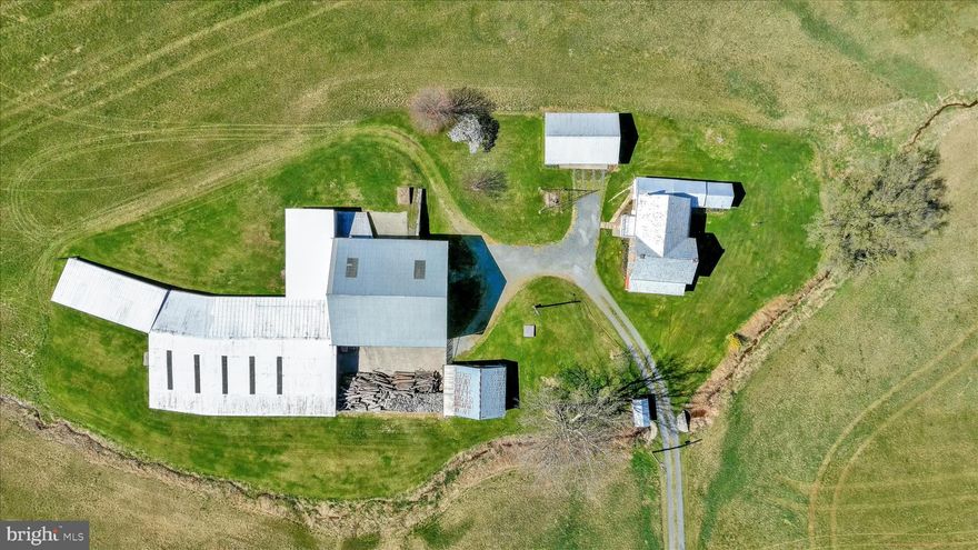 Set against the scenic backdrop of rolling countryside, this exceptional 45.5-acre property at 612 Capitol Hill Road in Dillsburg, PA offers a rare blend of history, versatility, and opportunity. With an impressive 947 feet of road frontage, this expansive parcel invites you to imagine, create, and cultivate a lifestyle rooted in both charm and potential.
At the heart of the property stands a historic stone residence, originally built in 1815 by Jacob and Elizabeth Larue. The home serves as a reminder of the land’s deep agricultural roots while offering a unique foundation for restoration or modernization. Surrounding the home, large barns and outbuildings provide ample space for storage, farming operations, or creative repurposing; perfect for those seeking a working property or a private rural retreat.
Once a thriving farm that supported over 1,000 chickens and 200 pigs, this land played a meaningful role in the local agricultural economy. Over time, the property evolved with the surrounding infrastructure and is now uniquely divided by Route 15, with approximately 7–8 acres positioned on the west side of the roadway. 
Today, the land stands ready for its next chapter. The property’s Open Space zoning presents a wide range of possibilities, from continued agricultural use to residential development; buyers are encouraged to explore permitted uses and envision the full potential this acreage holds.
With a minimum 2-acre lot requirement for residential use, the property offers an exciting opportunity for subdivision or the creation of a private estate community, all while maintaining a sense of space, privacy, and natural beauty. Whether you’re dreaming of a homestead, an investment opportunity, or a legacy property to pass down for generations, this land delivers unmatched flexibility.
Located in a peaceful and picturesque setting, yet still within reach of everyday conveniences, this property captures the essence of rural Pennsylvania living. Opportunities like this—where history, acreage, and future potential converge—are truly rare. Come walk the land, breathe in the possibilities, and bring your vision to life.