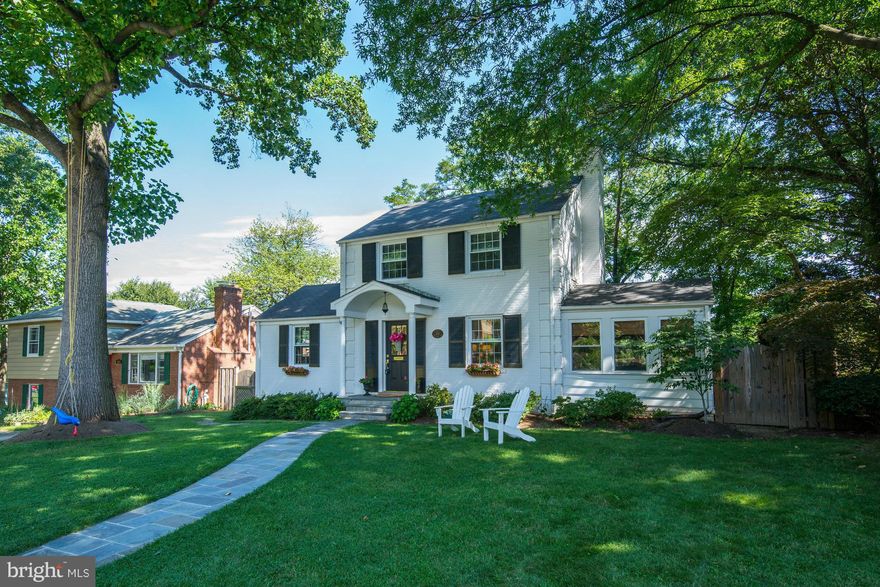 Thoughtfully crafted & designed both inside & out, this classic post war colonial is a perfect ten. Located in coveted Woodside & close to everything! The backyard has a beautiful professionally hardscaped patio centered around a stunning stone fireplace - perfect for entertaining guest or simply a relaxing evening. Other features include, a workshop, first level bedroom and ample storage space.