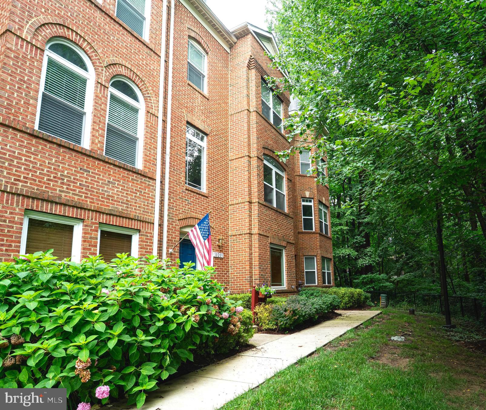 Welcome to this stunning and meticulously maintained 4-level townhome located in the desirable Governor’s Grant neighborhood of Columbia. Featuring stunning updates, hardwood floors, recessed lighting, and plantation shutters, this home is the perfect blend of modern elegance and thoughtful design
The entry level includes a welcoming foyer, a versatile office or flex space with French doors, a convenient powder room, laundry area, and access to the finished attached rear 2- car garage with customized storage.
The main level features a bright, open layout with expansive living and dining areas accented by elegant crown molding. The gourmet kitchen flows seamlessly into a welcoming breakfast or family room, centered around a striking gas fireplace with a sleek black surround. Culinary enthusiasts will appreciate the 42" wood cabinetry, stainless steel appliances, including a new refrigerator, gas stove, dishwasher, and updated lighting, along with a center island, balcony access to a Trex deck, and a newly added custom pantry organizer for optimized storage. A stylish half bath completes this level.
Upstairs, the spacious primary suite impresses with soaring vaulted ceilings, a wall of windows that fill the room with natural light, and a custom-designed walk-in closet with built-in shelving. The luxurious en suite bath boasts upgraded dual vanities, a jetted soaking tub, and a separate glass-enclosed shower for a spa-like retreat. Two additional bedrooms and an updated full hall bathroom complete this level.
At the top, a stunning full-level loft offers the ultimate flex space—perfect as a private guest suite, inspiring home office, or imaginative playroom. Bright and impressively spacious, this versatile retreat truly sets the home apart with its endless potential. Notable recent upgrades include a brand-new roof, new HVAC system, new hot water heater, updated ceiling fans and light fixtures, and a newer balcony (2021).
Ideally located just minutes from The Mall in Columbia and the Merriweather District, this home offers convenient access to premier shopping, dining, and entertainment. Enjoy nearby attractions such as Fairway Hills Golf Course, Hobbit’s Glen Golf Course, Howard Community College, and Merriweather Post Pavilion. For commuters, major routes including US-29, MD-32, and Route 100 are just around the corner, making travel easy and efficient.
Don’t miss this exceptional home with stylish updates and a fantastic location—schedule your tour today!