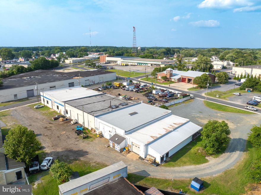 18,640 sq ft industrial building on 1.68 acres zoned City of Salisbury Light Industrial. The property was originally a warehouse-service distribution facility. It has 6 drive-in, drive-though overhead doors. Road frontage on Naylor Street is 385 feet and road frontage on Brown Street is 335 feet. The property can be sold with or without the existing leases in place. The current leases are month-to-month and generate $84,000 a year in gross income. See the property Data Sheet for additional details.  A W.R. McCain Appraisal of this property dated 6.17.2024 is available upon request.

- 18,640 sq ft warehouse with 6 drive-through doors
- 3-Phase Electrical Service for efficient operations
- Large 1.68-acre lot for ample space and flexibility
- City of Salisbury Light Industrial Zoning for diverse
business opportunities
- Prime location in the Eastern Shore area for strategic
access
18,760 warehouse building with 6 drive-through doors -
Central Salisbury Location  -