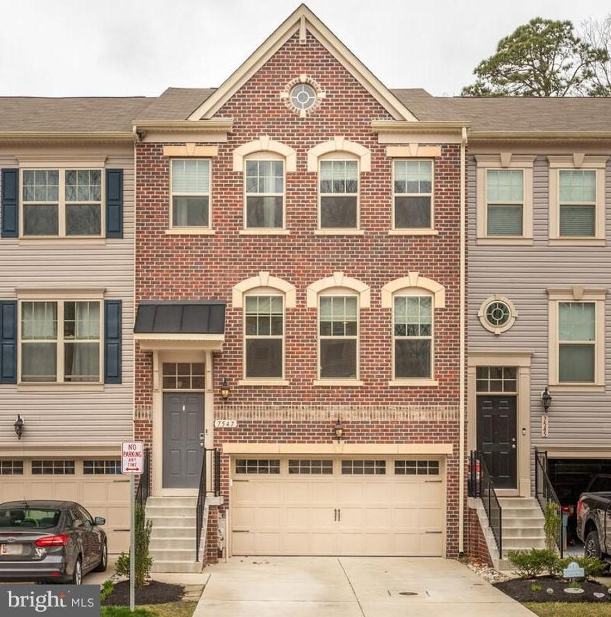 Beautiful, spacious, and immaculate 3 BR, 3.5 BA interior unit townhome built in 2018 in the wonderful community of Holly Ridge. The 3-story sunroom addition allows for plenty of living space of just over 2500 sq feet and a two car finished garage. The gourmet kitchen with updated backsplash and custom pantry, features a gas cooktop, double wall oven, huge island with granite countertops and stainless steel appliances. The living room boasts beautiful built-ins with an electric fireplace for a calming ambient setting. The upper level consist of a spacious owner’s suite with sitting area and a custom walk-in closet. The private bath includes two separate vanities and a large ceramic tile-surround shower. Two additional bedrooms, a second full bath, and a convenient laundry room wrap up the upper floor.  The lower level is fully finished with a full bathroom and has access to a fully fenced backyard with pet-friendly artificial turf.  Convenient location includes playgrounds and a dog park within the community and easy access to the main roads.
