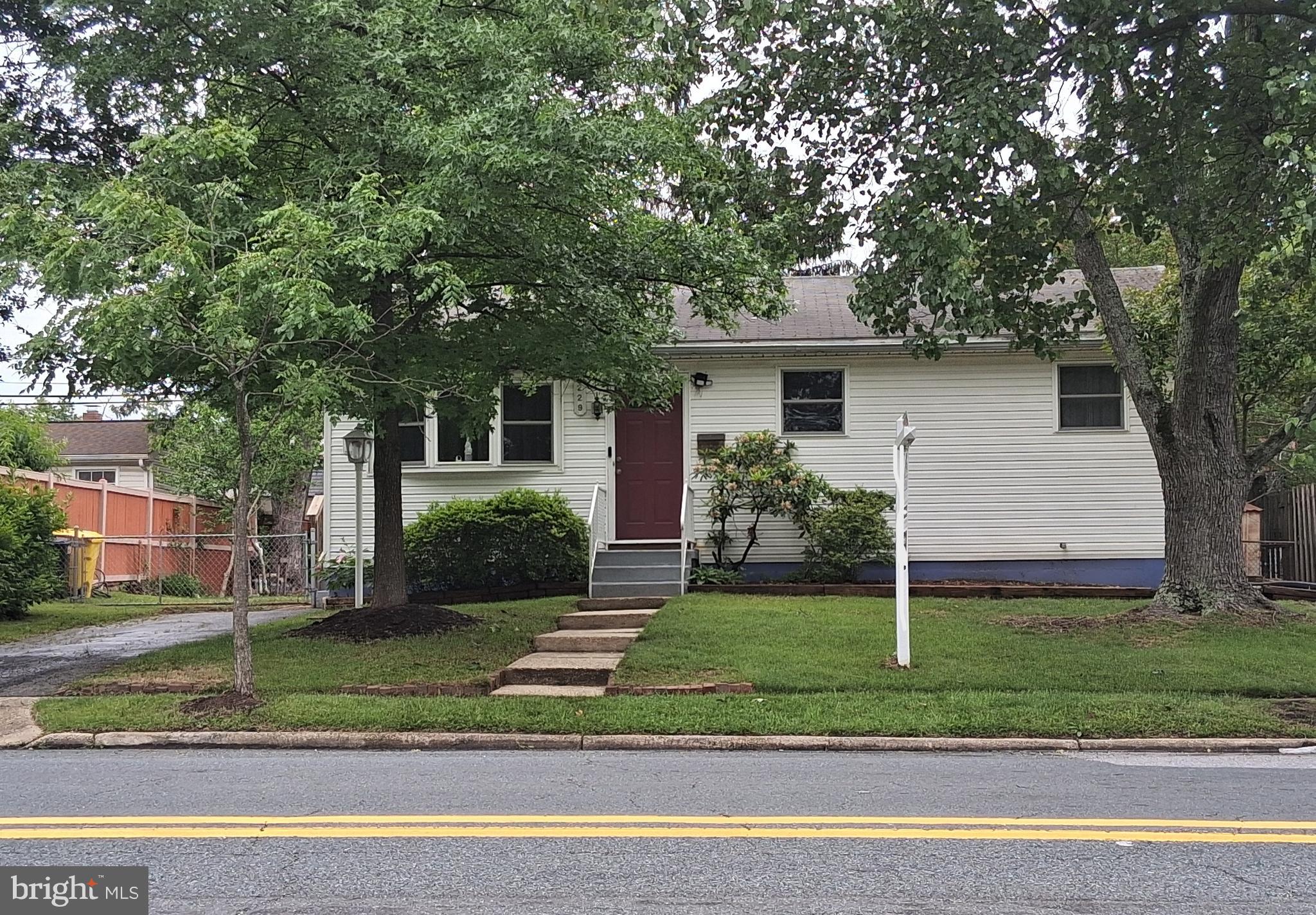 Come to see this cozy rambler-style house. Recently update with open spaces. On the First floor has a comfortable main living room, kitchen, dining room, refinished wood floor another large room that acts as a living room, and it can be whatever you want, living room, another room, a game room, an office, it has a fireplace and access to a Deck. Fenced yard, it has a patio with 2 storage sheds outside.
it has in this first level three rooms and a full bathroom. The basement had a couple renovations also, fully finish, with two big rooms, for many options, space to make three or four bedrooms or can be anything you want family room or game room, it has a full bathroom, adaptation with plumber and electricity to do a kitchenet near to the laundry room with lots of potential, the driveway is for two cars and off street parking but you can make it bigger also. The owner has some cameras inside and outside of the property to has access to the house from work. Be aware of the cameras. This house is well located, close to shopping, schools, and thoroughfares, please use showing time to schedule it, if you go and show please leave your business card. Come and don't miss the opportunity to make it your home. it will not last long. The house is sold as is.