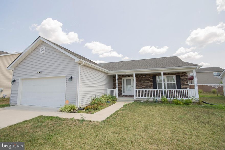 3 bedroom, 2 full bath Rancher featuring vaulted ceilings and hardwood floors in main living areas,  natural gas fireplace w/ mantle and granite surround in the family room, Kitchen w/ island and granite countertops, and spacious 12x18 primary bedroom with walk in closet and full bath with tile shower and ceramic tile floors.  Outside features a 10x12 rear screened in porch and a large front porch with stone front.  Home has a 2-car garage with auto opener and concrete driveway.  Washer/ Dryer, water softener, and security system convey.