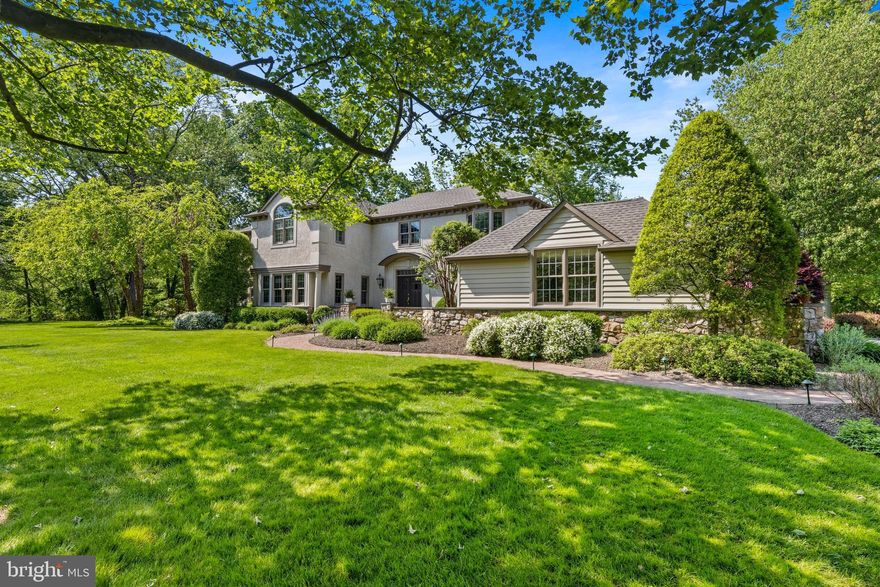 Life's a beach at Leopard Lake!  Members of this community enjoy access to 11 acres of space surrounding a lake and private beach.  You can swim, kayak, relax on the beach, play tennis or pickleball, take the kids to the newly installed playground or enjoy the incredible views from the walking path bordering the lake.  A rare opportunity awaits the buyers of 435 Lantern Lane.  This elegant and exceptionally well-maintained home offers both lake and creek views in a serene and private setting.  The owners have spared no expense in upgrading and maintaining both the classic four-bedroom center-hall home and the 1.5-acre grounds with specimen plantings.        The exterior features include a meandering creek, stone-walled front courtyard, Belgian block-lined driveway, brick paths, private deck, sprinkler system, shed and drainage management system.           Follow the brick path to the home’s stone-walled front courtyard, where a serene view of the lake beckons.  Step through the grand double doors with beveled glass into a spacious entry foyer where you will first notice the thoughtful lighting details.  The foyer leads to the main staircase, breakfast room, kitchen, hall closet outfitted by California Closets, and the east and west wings of the home.            The east wing of the first floor features an eat-in kitchen with granite counters, breakfast room, screen porch with vaulted ceiling, great room with a vaulted ceiling, beams with uplighting, fireplace and window seat, a home office with custom built-in desk and bookcases, fireplace and window seats, a half bath and a mud room with laundry closet and exit to the garage, screen porch or side pathway.           On the western side of the foyer is a bright and elegant dining room featuring furniture nooks and space that will accommodate ample seating for large family gatherings.  From the dining area, step into the foyer and down into the office/living room with a French door leading to the outside.  A second staircase from this room features dramatic two-story windows offering a view of the creek and leading to the private owners’ suite.            On the upper level you will find an addition comprising the owners’ magnificent retreat featuring a large bedroom with tray ceiling, cedar-lined window seat overlooking the back yard, elegant and roomy bathroom with dual vanities, spacious shower, soaking tub and private water closet.  The retreat’s dual walk-in closets with pocket doors were outfitted by California Closets. From this retreat a private hallway leads to two bedrooms and a hall bath, plus an additional bedroom with a walk-in closet and ensuite bathroom.           Throughout this home you will find elegant custom moldings and arches, updated Marvin windows and custom lighting designed to accentuate areas on the walls where you may hang your treasured artwork.  This home has been meticulously updated and maintained, both inside and out.           The propane-fueled generator will provide the power you need to operate vital systems in the event of a power outage.           The property’s environs provide a beautiful space for enjoying the surrounding beauty of the home and lake.  Park some Adirondack chairs around your firepit and enjoy the view of the lake while relaxing with friends or family.  Or you can pull up a seat next to the creek and relax in the shade while listening to the babble of the flowing water.  You will also enjoy the views and privacy of the serene back yard from the spacious deck.    The lake and grounds are owned by Leopard Lakes Farm, Inc.  Buyers pay this corporation a one-time transfer fee of $5,000 at settlement and annual dues of $2,240