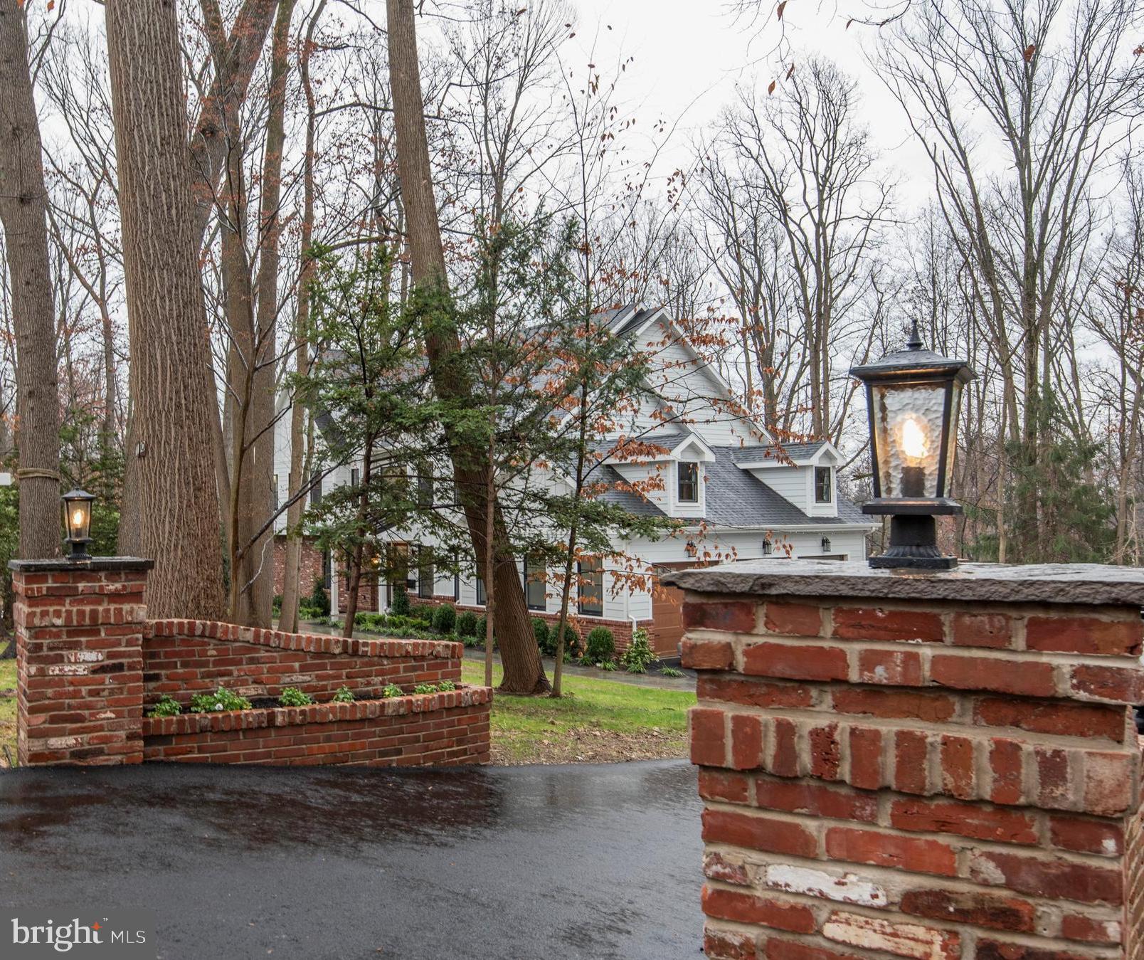 Far from the Madding Crowd...but not too far! Idyllically perched on one of the prettiest parcels in Wayne, sits this newly constructed 5BR/4.2 Bath, 3 car Garage home which is truly an unparalleled treasure. You are welcomed into this 5000+SF property by flanked, brick pillars, mature trees and tranquil grounds. Walk up the pavered path, pass thru the covered Portal and into the Grand Entry. Your eyes are immediately drawn from the open floor plan to the magnificent views of the backyard but be still, my heart, we have just begun. Atop the HW flooring in Center Hall is Staircase w/contemporary Black Metal Railing lit by a Black and Polished Nickel Chandelier where eclectic meets artisan. Situated on either side of Center Hall is LR and DR both w/ Wainscotting and Chair Rail + Butler?s Pantry and Wet Bar off Dining Room. Center Hall opens into Kitchen with Island, Breakfast Room, Family Room and Large Study. The elegant, bright Kitchen is equipped w/custom cabinetry, custom tile backsplash w/pot filler and range hood, Quartz Countertops and GE Cafe SS Appliances and expansive Island with quartz waterfall edge. Adjacent is convenient Breakfast Room opening onto large flagstone tiled Patio with custom brick, wood fired Grill and just steps from spacious Backyard and/or 3 Car Garage. Just beyond kitchen and Breakfast Room is spacious Family Room with windowed wall which includes 2 sets of Double Doors with transoms opening onto a 2nd brick patio and grounds and separated by sleek gas Fireplace. Alongside FR are Fr. Doors opening into private Study (Morning. Yoga or Music Room) complete with custom built ins and serene views. As we continue thru 1st Floor there's a Guest Suite (or separate Study) w/custom cabinetry and its own Private tiled Bath. There's also a separate Powder Room off Family Room. An entry in from 3 Car Garage with Bench and Cubbies complete the 1st floor. Walk up the elegant staircase and you will find a huge open area which can be utilized as a 2nd Family Room (or flex space suited to your family's needs). Commodious Master Bedroom Suite with Tray ceiling, 2 large outfitted closets and sumptuous custom tiled Master Bath w/enclosed frameless Shower, Free-standing Tub, 2 Vanities (Hers w/separate seating for make-up), enclosed toilet area and large picture window overlooking grounds. There are 2 Add'l Jack and Jill Bedrooms plus 1 Prince/Princess suite and convenient Laundry Room. Lower Level is partially finished with carpet, lighting and Powder Room. This is daylight with its own separate entry. This Wayne gem is highlighted by an exceptional level of finish, premium building materials and a thoughtful design that thoroughly exceeds expectations. Located in the popular Strafford Village neighborhood in a fabulous walk-to Wayne location as well as train station in sought-after T/E School District. (Room for pool.) Can't you picture yourself enjoying the Holidays and watching the changing seasons from every vista in your new home!!