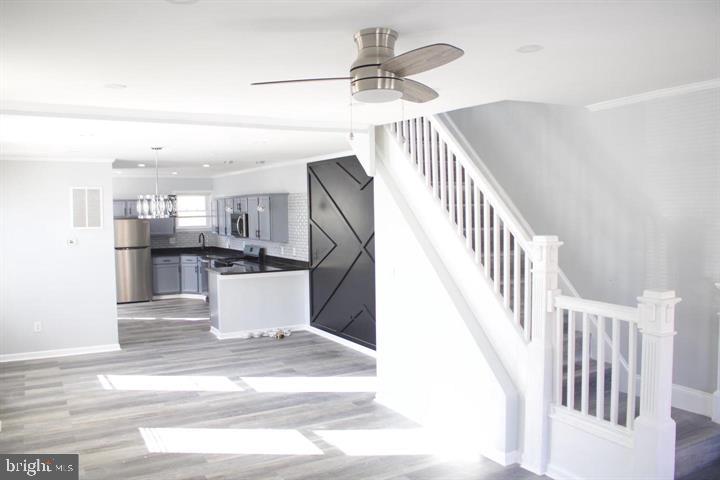 Opportunity Knocks in West Baltimore! This beautifully updated 4-bedroom, 1.5-bathroom rowhome is the perfect blend of modern finishes and smart investment potential. The stylish kitchen shines with stainless steel appliances, granite countertops, eye-catching pendant lighting, a sleek backsplash, and new flooring—ready for both daily living and entertaining. The main level also features a convenient half bathroom.
Upstairs, you’ll find four generously sized bedrooms and a fully renovated full bathroom, complete with custom tilework and contemporary fixtures. Whether you're expanding your rental portfolio or searching for your first investment, this home checks all the boxes. A Section 8 tenant is currently in place and would love to stay—offering immediate and stable cash flow potential.
With easy access to major highways and just under 10 minutes from Downtown Baltimore, this location is ideal for commuters and renters alike. Don’t miss your chance to own a turn-key property with built-in income!