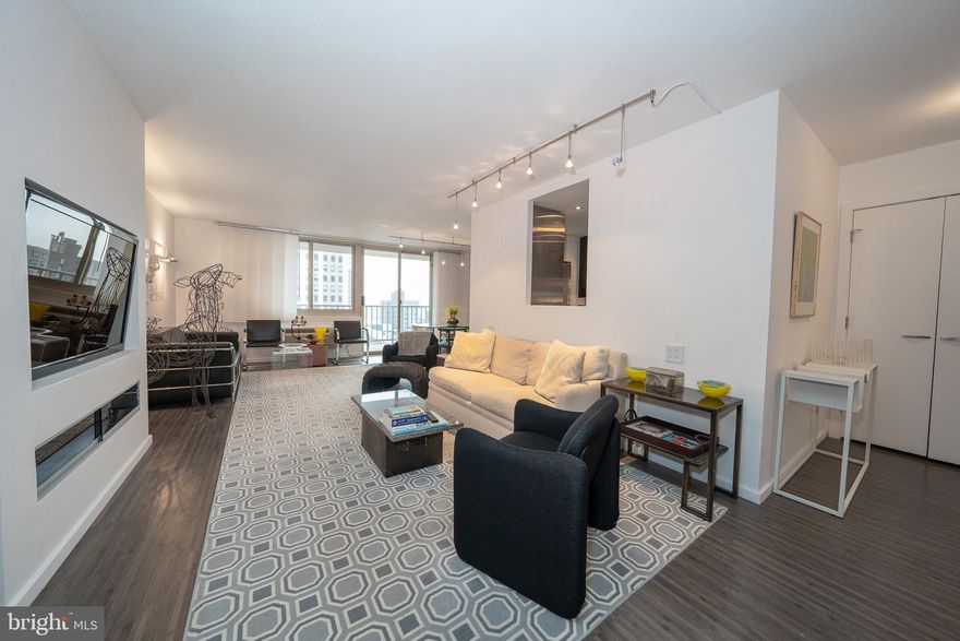 Welcome to this stunning rarely available South Side 3-bedroom, 2-bathroom, 1,959 square foot unit WITH BALCONY that boasts elegance, luxury, and fabulous views! As you step inside, you will be greeted with a spacious living room that is perfect for entertaining guests. The open concept design seamlessly connects the living room to the dining area and kitchen, creating a cohesive living space that is perfect for your lifestyle. The kitchen has been completely renovated to include new cabinets, granite counter-tops, and all full-size stainless-steel appliances. The bathroom has been upgraded and boasts a floor to ceiling tiled enlarged shower with glass door enclosure. The primary bedroom comes with a walk-in closet. All bedrooms offer plenty of natural light and ample closet space. 
This condo has been thoughtfully designed with the modern homeowner in mind, offering premium amenities such as in-suite laundry and a private balcony with breathtaking views of the city. You will appreciate the attention to detail that has been put into every aspect of this home, from the high-end appliances to the beautiful hardwood floors.
The William Penn House features 24-hour Security and Doorman, On-Site Management and Maintenance, Rooftop Pool with amazing views of the city. On premise VALET Parking available for 100 per month for one car. THE MONTHLY FEE INCLUDES ALMOST EVERYTHING: All Utilities including electric, heat, air conditioning, water & basic cable, All Real Estate Taxes & Maintenance Package. This spectacular building has NEVER HAD AN ASSESSMENT! Nominal real estate transfer tax & no title insurance required. Experience the ability to walk out your door to first class, 4-star restaurants, fabulous shopping & all the conveniences of this sought-after neighborhood. Walk score is a 98! One time admin fee paid at closing.