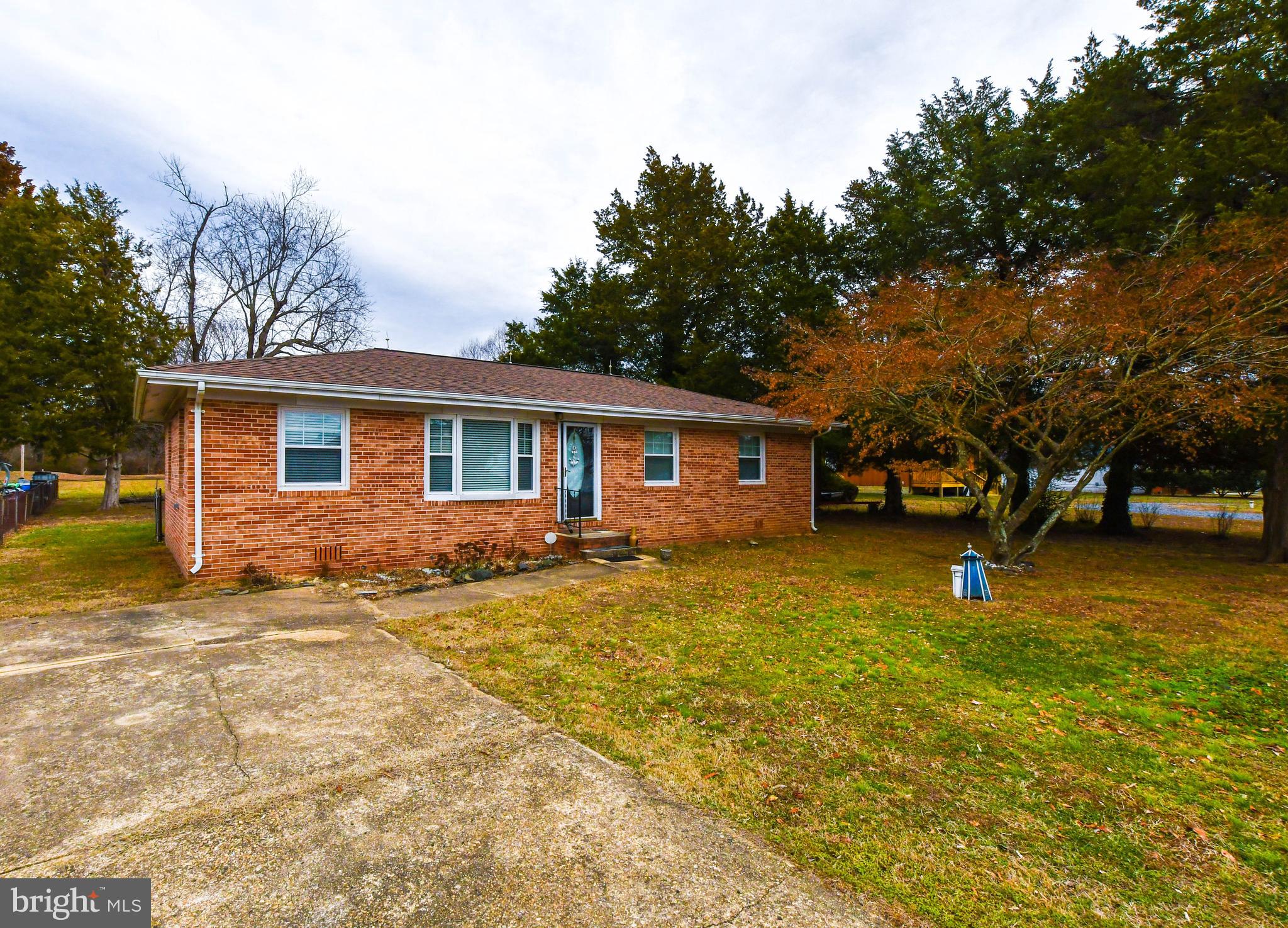 JUST REDUCED! Discover this charming and cozy brick rambler with stunning waterfront views, offering endless potential for both personal enjoyment and investment opportunities. This home presents a unique opportunity for Airbnb or rental income. NOTE: Possible structural damage-buyers are advised to conduct their own inspections. Don't miss this chance to unlock the full potential of this waterfront gem! Sold strictly AS-IS.