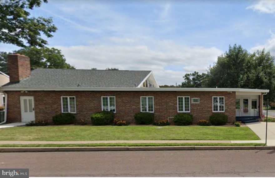 Fully rented for almost 2 yrs! Ideal for offices and or professional/medical space. The upper (street level) is a 2,400 suite, leased through July 2022! The lower level consists of three office suites, all currently leased. There is a common area with rest rooms on the lower level. The visible corner location provides great exposure for tenants.  A  large lower level parking lot completes this property. Perfect for an investor! Fully rented at 33,