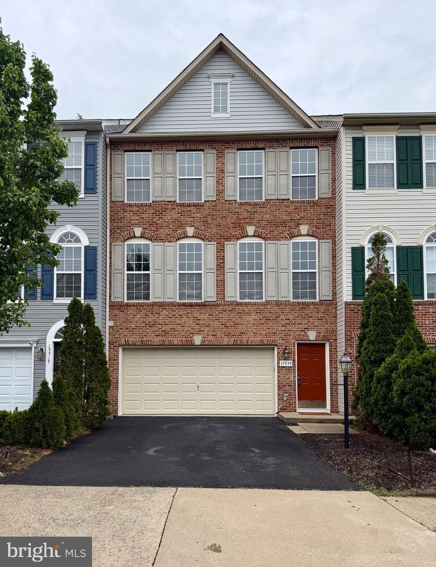 Welcome to a beautifully refreshed three-level brick-front townhome. This home features an expansive, open-concept main level designed for both entertaining and comfortable daily living. The heart of the home flows seamlessly from the kitchen into a sun-drenched living area, anchored by a timeless fireplace and framed by large windows that flood the space with natural light. The upper level offers three generous bedrooms, including a massive primary suite. The centerpiece of this suite is the luxury primary bathroom, a spa-inspired bath featuring a deep corner soaking tub, elegant marble-style tiling, and a large window for a serene, airy feel. With fresh paint, plush new carpeting, and premium upgrades throughout, this home is move-in ready and perfectly polished.