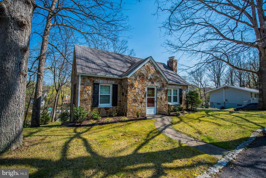 Just minutes to downtown Berkeley Springs, this home has been lovingly remodeled by the owner, incl. finishing part of the bsmt.. Glassed porch, entry level BR, wood floors, & double pane windows on main level.  2nd level with 2 BR, 1 BA, new carpet, storm windows. Fireplace in LR & Wood stove in bsmt. needs new flue. Garage for small to mid sz cars. Terraced back yard w/ stone patio & BBQ pit