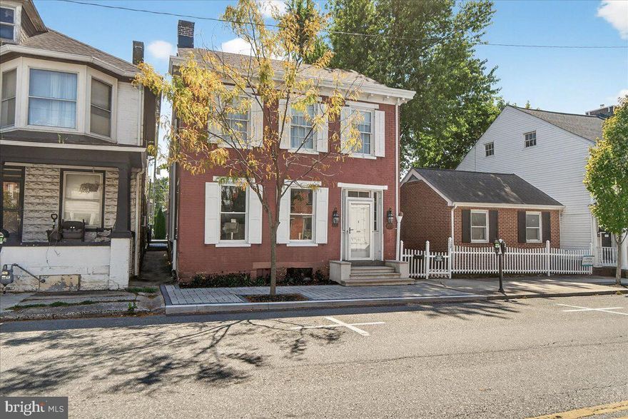 New Professional photos to be done on the 9th. Welcome home to a Piece of History! Prepare to be captivated as you step into the Jeremiah and Rebecca Culp House, where every inch has been thoughtfully renovated with impeccable attention to detail.  The Sellers have truly transformed this house into a masterpiece that will steal your heart. They have left no stone unturned! The Sellers have added eight mini splits to make it even more comfortable in the summer months. The front steps and sidewalk have also taken on a new look. The detached heated garage has new garage doors, remotes for both sides, new roof, back doors, back steps and a fresh coat of paint.  The power lines have even been buried from the garage to the main house. The attic has new windows,  Gutters have been added and storm doors on front and side door. A security system was also added. Main water line replaced from the housee to the street. 
As you explore the home, you'll discover a chef's dream kitchen, complete with a fabulous island, brand new stainless steel appliances, and luxurious quartz countertops. With such a well-appointed space, entertaining becomes effortless, allowing you to host gatherings with ease and create unforgettable memories.
This historic gem offers five generously-sized bedrooms and three full baths, providing ample space for relaxation and privacy. Additionally, the private backyard and detached two-bay  garage that holds 4 cars offer a serene retreat and convenient parking options.
Located just a block and a half from the square, this home provides the perfect opportunity to immerse yourself in the charm of the area. Whether you fancy a stroll to enjoy a delectable dinner, indulge in some shopping, catch a show at the Majestic Theatre, or simply soak in the rich history that surrounds you, everything is within reach.
Speaking of history, let us share a fascinating tidbit about this remarkable residence. Jeremiah and Rebecca Culp, the original homeowners, displayed exceptional kindness and bravery during the Civil War by opening their home to wounded soldiers. The back room off the kitchen even served as an operating room, showcasing the house's historical significance. With 12 children, including their beloved Jeremiah Meade Culp, born on July 4th, 1863, this home holds the poignant legacy of a battle baby.
 (Watch:  Battle Babies: Jeremiah and Rebecca Culp Family on You Tube)
For those who crave a connection to the past and a desire to own a home with such historical resonance, this is an absolute must-see. Don't miss out on the opportunity to experience the charm, elegance, and rich heritage that this property has to offer. Call today to schedule your appointment and embark on a journey through time in this extraordinary dwelling. Agents be sure to share the updated history story in the documents!!