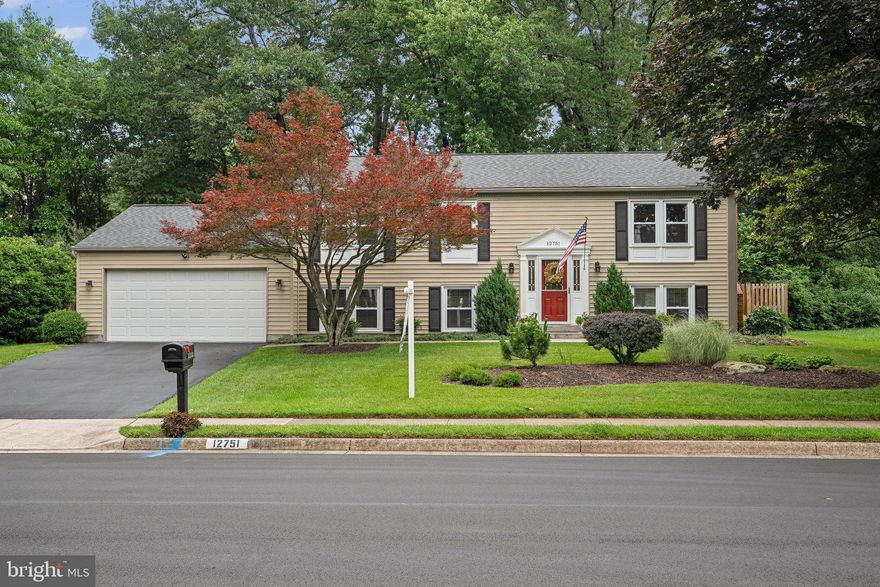 OPEN HOUSE CANCELED! 
Move-in ready 5-bedroom, 3-bathroom home in the highly sought-after Fox Mill Estates!  This beautifully updated home blends modern elegance with spacious, light-filled charm, offering the perfect retreat for everyday living. Step inside to discover stunning wide plank Tennessee Maple flooring that flows seamlessly throughout the entire home. The bright, spacious living room with recessed lighting opens to the dining room, which leads out to the private back deck — perfect for indoor-outdoor entertaining.

The kitchen features white cabinetry, quartz countertops, a custom backsplash, stainless steel appliances, and a built-in pantry. The large primary suite includes two separate closets and a renovated en-suite bathroom. Two additional generously sized bedrooms and a full bathroom complete the main level.

Downstairs, the expansive family room with a stone-surround wood stove insert is ready for gatherings, along with two more bedrooms and a full bathroom. The sub-basement houses a washer, dryer, and utility sink for added convenience.

Outdoor living is a dream with a private oversized deck featuring a pergola, a lower-level patio, extensive terraced landscaping, and a fully fenced backyard with space for a garden, flowers, or a swing set.

Recent updates include: Electrical panel (2020), Roof with soffit vent system (2020), Gutters with leaf filters (2020), Washer and dryer, Recessed lighting, Whole-house engineered maple flooring

Enjoy all the amenities Fox Mill Estates has to offer, including walking paths, tennis courts, local pools (separate membership), tot lots, and more! Conveniently located just 3 miles from the Silver Line Metro and close to Metro bus stops, Park & Ride lots, and major commuter routes such as Fairfax County Parkway, Rt 50, I-66, Rt 28, and the Dulles Toll Road. Also near Dulles Airport, Fox Mill Shopping Center, Reston Town Center, Fairfax Corner, Fair Oaks Mall, Fair Lakes Shopping Center, and Wegmans.

Opportunity to purchase a membership at the nearby Pinecrest Pool and Tennis Club!