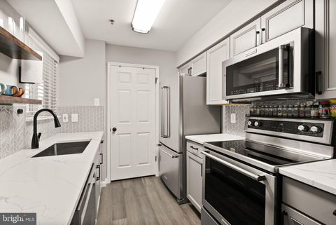 Photo of 1504 Lincoln Way #406, MCLEAN, VA 22102 (MLS # VAFX2302052)