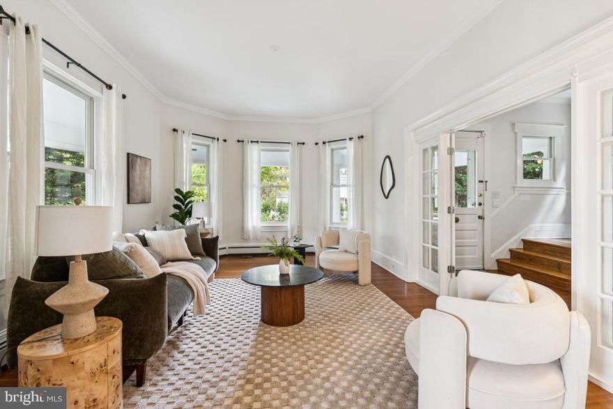 Own a Piece of History: The Stunning Newton Allen House is Reimagined

Welcome to **517 W Joppa Road**, the magnificent and historic **Newton Allen House**. Built in 1907 by Maryland State Senator Newton Allen, this distinguished **detached West Towson residence** perfectly blends **timeless elegance with contemporary luxury**. A true move-in dream, this 3,750 square foot home has been meticulously updated with **over $400,000 in recent renovations** by renowned experts, Delbert Adams Construction Group and Sunnyfields.

Exquisite Interiors & Thoughtful Design
Step through the charming foyer and into an inviting, open layout designed for modern living and sophisticated entertaining. The main floor features **three expansive rooms**: a formal living room, a large den with a marble mantel, and a striking formal dining room with a burn burning fireplace. The dining room, complete with a **built-in bar and wine fridge**, is ready to host your most elegant dinners.

The bright, sunny kitchen and rear sunporch offer seamless indoor-outdoor living, with direct access to the new rear patio. A convenient **rear staircase** from the kitchen adds a unique, practical touch.

Spacious Sanctuary for the Modern Family
With **five main bedrooms** and a smaller sixth bedroom, this home offers incredible versatility. The smaller room, complete with its own balcony, is ideal for a dedicated **home office** or creative space.

The **three and a half bathrooms** have been beautifully appointed, including a new third-floor bath by Delbert Adams. The **luxurious primary en suite** is a private retreat, featuring two vanities, a **heated towel bar**, a walk-in shower, and a jetted tub. Practical living is enhanced by a **dedicated second-floor laundry room**. Enjoy classic **hardwood floors** throughout the first and second floors and brand-new plush carpet on the redesigned third floor.

A Jaw-Dropping Third-Floor Transformation
The entire third floor has been completely reimagined! It now boasts **two beautifully appointed bedrooms**, a cozy reading nook, a full bathroom with a walk-in shower, and a fun, unexpected element: a **secret door leading to a hidden room beyond!** New ceiling fans have been installed throughout the house for optimal comfort.

Premier Amenities & Outdoor Oasis. The attention to detail extends to the exterior:
**Brand-new wrap-around front porch** with a deck and ceilings, creating an instant welcoming curb appeal.
* Professionally redesigned front landscaping by Natural Concerns, featuring a **fast-growing privacy hedge** (3’ a year!) that will soon ensure privacy between the parking area and the yard. 
* Newly paved driveway with a convenient **Chargepoint EV charger**.
* A newly installed rear patio and steps perfect for outdoor entertaining and grilling.

Throughout the year, you'll be comfortable with **central air conditioning on the upper two levels and heating**. The full basement offers **ample storage**, a **ground-level walk-out**, and a rear space with windows perfect for a gardening table and tools.

**517 W Joppa Rd** is a unique and rare opportunity to own a piece of **Towson's history**, perfectly updated with every modern amenity you desire.

*Ready to step into your dream home?*