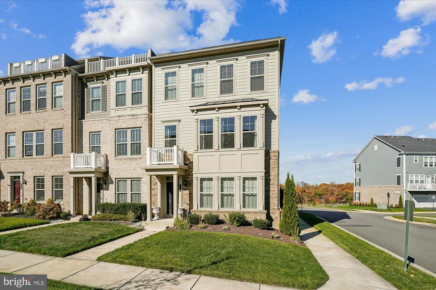 The search stops here after previewing this Stunning End-Unit Emerson Model Townhome –  Fantastic Value in Potomac Shores!
Discover exceptional living in this beautifully maintained three-level end-unit townhome, ideally located in the heart of Potomac Shores. Enjoy walkable access to the award-winning Potomac Shores community, where the $200/month HOA includes high-speed internet, trash service, and access to incredible resort-style amenities: three pools, the Shores Club Fitness Barn, 9+ miles of wooded trails, Tidewater Grill, and the Jack Nicklaus Signature Golf Course. Enjoy the canoe/kayak launch, community gardens, and a thriving calendar of social events.  Top-rated schools, and the exciting addition of the future VRE station and Town Center—all just moments away. top-tier amenities including the Golf Club, Gym, Pools, Multi-Purpose Court, Community Gardens, The Shores Club, and—coming soon—the VRE station and Town Center.
This home offers a charming courtyard entrance and partial tree-lined views for added privacy and serenity. Inside, a spacious flex room on the entry level provides the perfect space for a home office, gym, or creative studio.
Step into your dream garage—professionally finished with painted walls, a premium Trax floor system, and custom storage solutions to meet all your organizational needs.
The second level is the heart of the home, featuring a bright, modern kitchen with white cabinetry, a large center island, stainless steel appliances, a gas cooktop, and a built-in buffet with extra cabinetry. Custom built-ins in the pantry and closets maximize space and keep everything tidy. Step out onto the deck for easy outdoor entertaining. On the third level, the primary suite offers luxury and retreat—featuring room for a king bed, a walk-in closet with custom organizers, and a spa-like bath with walk-in shower, double sink vanity, and glass-enclosed shower. Two additional bedrooms with custom closets, a full bath, a linen closet, and a laundry area complete this level. New Hardwood flooring throughout the third floor.