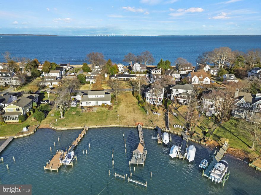 A truly rare dual parcel opportunity in Bay Ridge, where the value lies in purchasing both properties together—a substantial homesite with an existing residence directly across the street from a 57-foot waterfront lot on Lake Ogleton.

The upland parcel spans an impressive 150 feet in width and currently features a comfortable, move-in-ready home, allowing immediate enjoyment while you plan for the future. A full-width screened front porch captures bay breezes, while the interior includes an updated kitchen with quartz countertops, a generous island, and SS appliances. A two-car garage and ample driveway parking add everyday convenience. This lot offers exceptional long-term potential, including the ability to design a future two-story residence with possible Chesapeake Bay and Bay Bridge views.

Directly across the street, the companion waterfront lot provides protected water access on Lake Ogleton, complete with an existing dock in need of repair providing an ideal canvas for creating your private waterfront retreat. Whether your vision is a custom coastal estate, a modern waterfront design, or a classic Bay Ridge cottage, the combination of these two parcels delivers a rare blend of space, flexibility, and true water access that is nearly impossible to replicate.

 The sought-after Bay Ridge Community features a plethora of amenities including community pool with a clubhouse that overlooks the beautiful waters of the Bay, community beaches on both the River and the Bay and a community Marina with a newly renovated clubhouse. Off-the-water activities include enjoying the basketball court, playground, ball fields, pickleball courts, common areas and year-round community activities. Walk or ride your bike for miles along the water and enjoy all the benefits of the Bay Ridge lifestyle, there is no other place like it! Located just minutes from downtown Annapolis and Eastport which offer the perfect balance of small-town charm and big world sophistication. Traveling or commuting is just as convenient by easily accessing Rt. 50 and 97 which provides direct access to Baltimore, BWI, Ft. Meade/NSA and Washington, DC., or head over the Bay Bridge to the Eastern Shore for a quick beach vacation. Welcome Home!