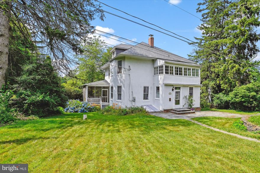 If you're looking for charm, character, and plenty of room to spread out, look no further - this spacious American Four Square is perched on a pristine lot that stretches over half an acre. Built in the early 1900s, this home showcases high ceilings, hardwood floors, built-ins, a slate roof, and other unique details that were common for the time, yet still sought after today. On the main level, you will find a welcoming foyer, a large living room and dining room complete with a fireplace, and a gourmet kitchen with granite and quarter-sawn oak custom cabinetry.  A "drop zone" at the back door and a half bath round out this level. The second level has a full bath, three oversized bedrooms, and a smaller fourth bedroom that leads to a sleeping porch. From there, you can keep going up to the third floor, which is ready for your finishing touches to make it whatever you need it to be - bedroom, office, playroom, craft room - you name it, you have the space for it! The basement houses the laundry, storage, and a workshop area. Outside is an entertainer's dream with a wrap-around porch that is partially screened, a large backyard featuring a bluestone patio, mature trees, and flower gardens. The large lot makes you forget you're just minutes away from shopping or dining in the heart of Catonsville! Convenient commuting access for Baltimore and its suburbs, as well as DC. Remember, life is great is 21228!