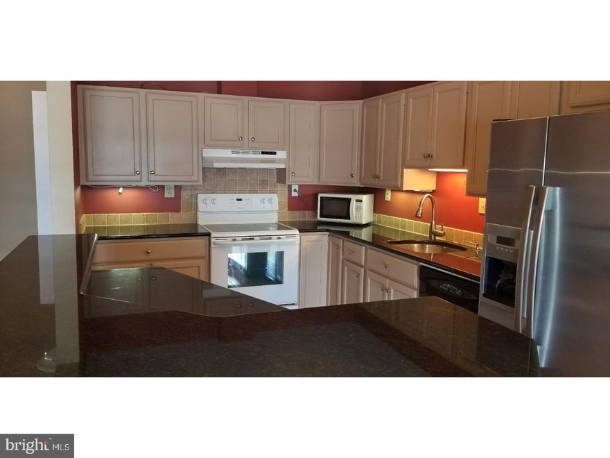 This is a waterfront condo with 2 bedrooms, 2 full bathrooms, and a balcony off of the Master Suite. It has a recently updated kitchen with new appliances as well as hardwood floors and Cathedral ceilings throughout. Over-sized living room features a natural wood-burning fireplace, and beautiful 4th floor views of Penn's Landing and the waterfront. Unit comes with a PARKING SPOT, full access to the gym and pool, and 24 hour concierge service and just a walk away from Old City, Penn's Landing, and Northern Liberties! Located in the George McCall school catchment.